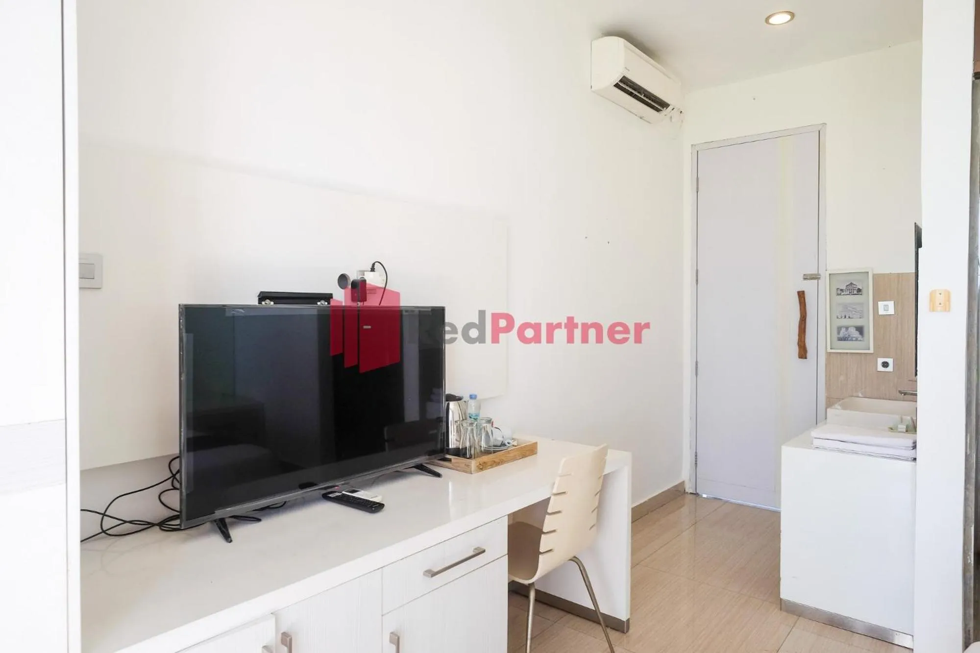 TV and multimedia in Sawah Joglo Boutique Villa Mitra RedDoorz