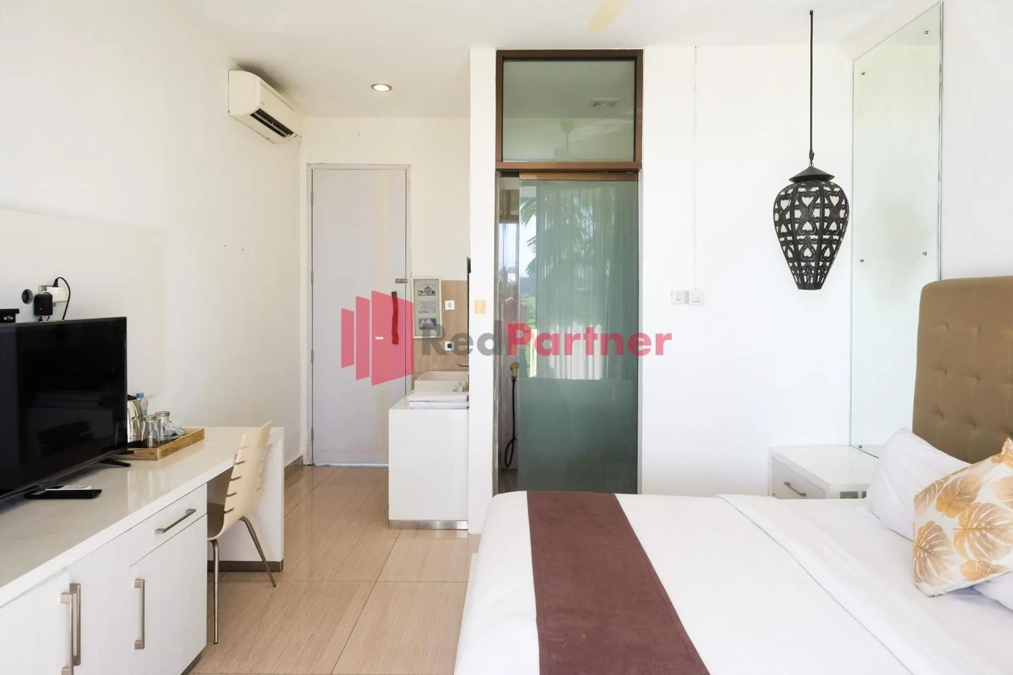 Bed in Sawah Joglo Boutique Villa Mitra RedDoorz