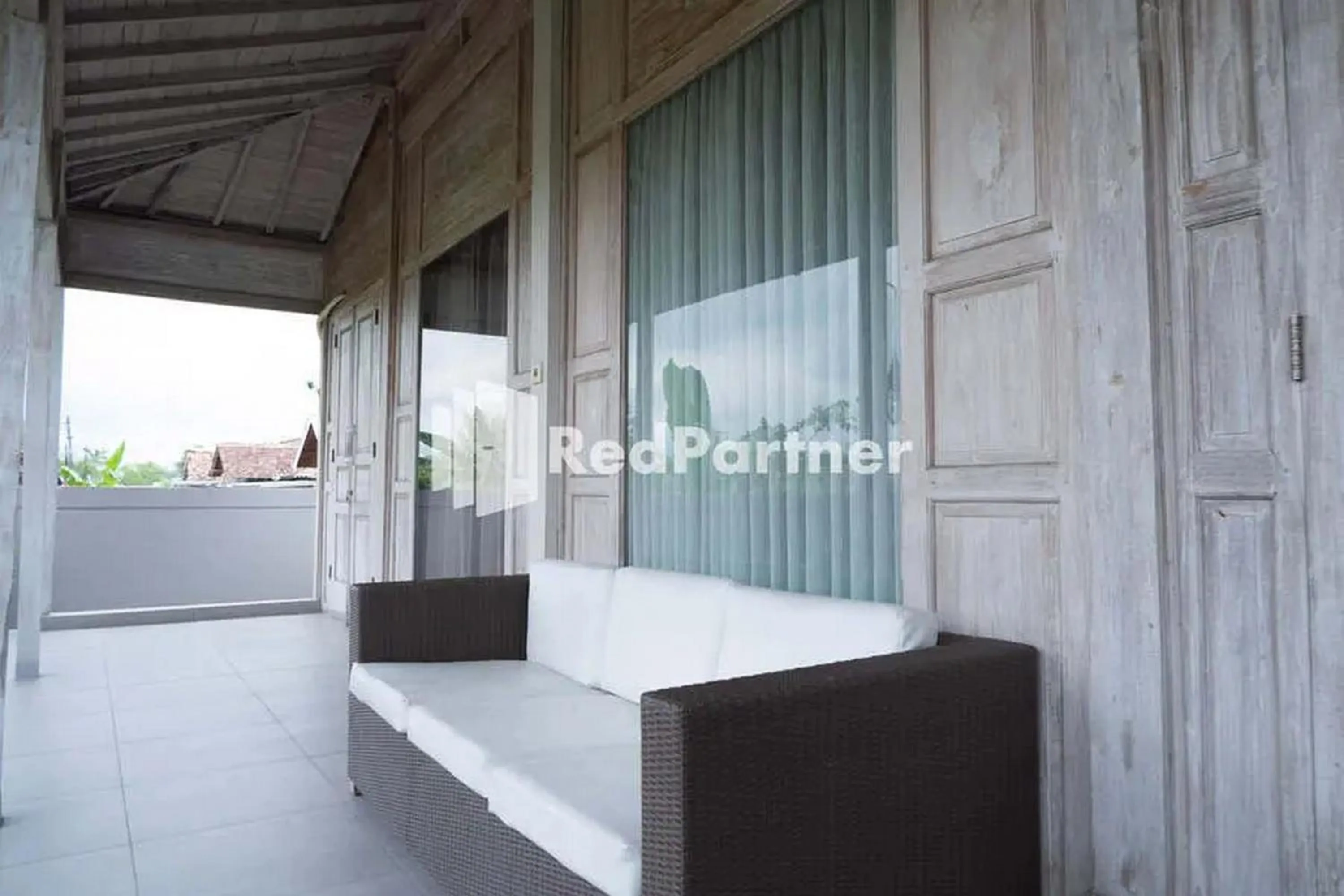 Seating area in Sawah Joglo Boutique Villa Mitra RedDoorz