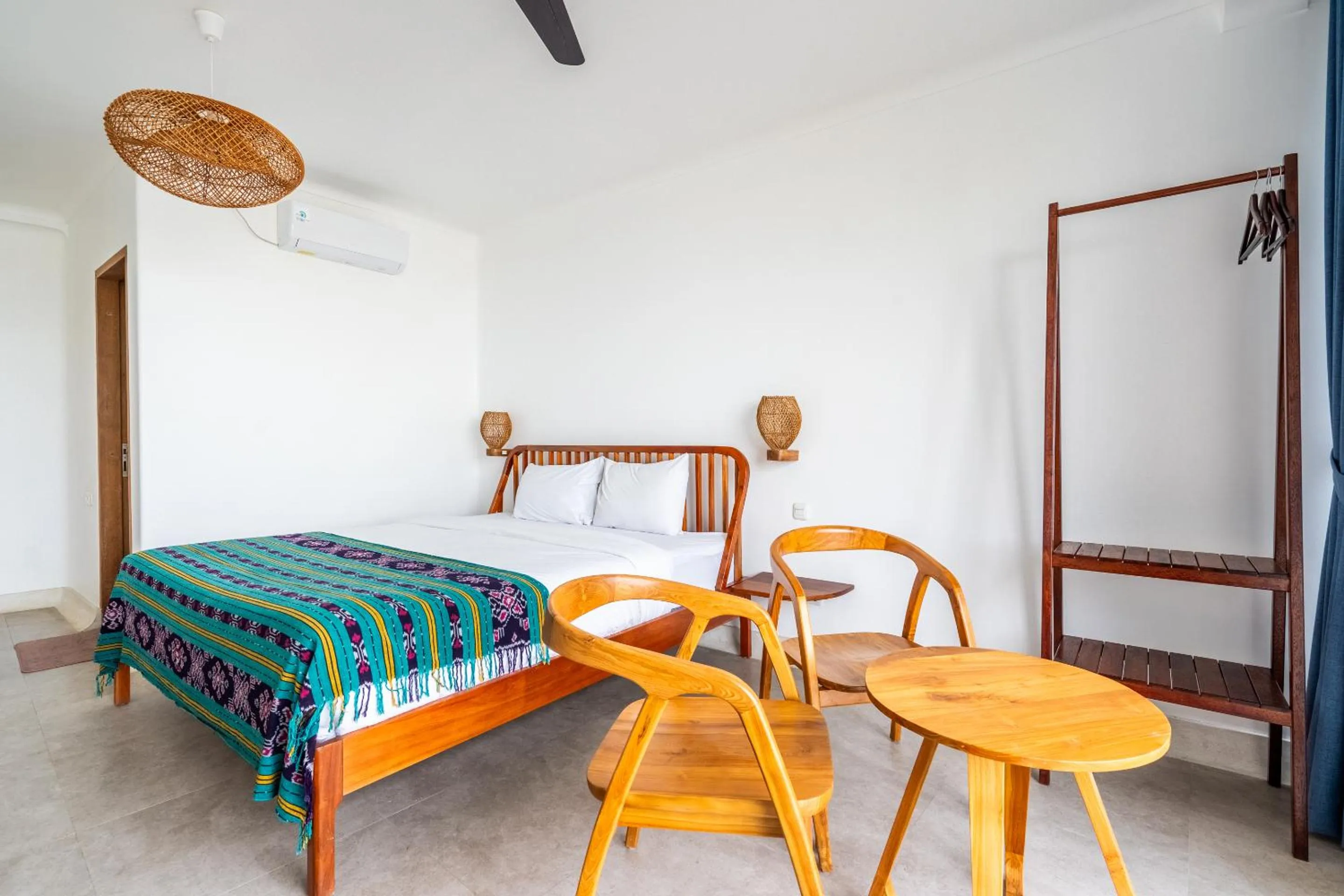 Bed in Inlight Lombok Beach Hotel