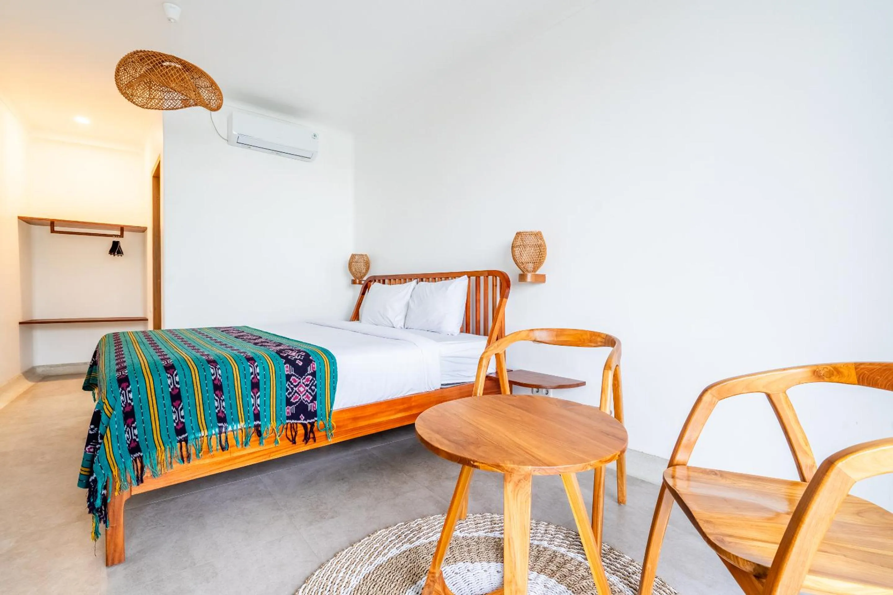 Bed in Inlight Lombok Beach Hotel