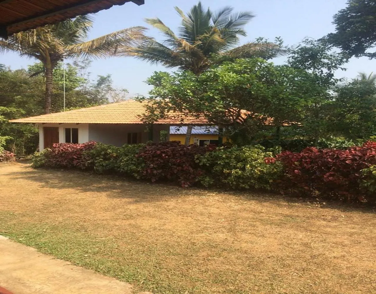 Property building in Hasiru Farms Homestay by StayApart