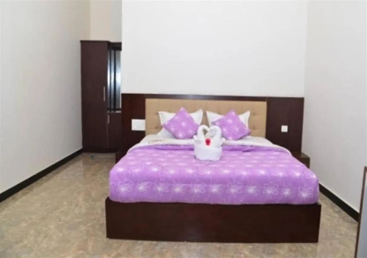 Bed in Orange Valley Plantation Holiday Coorg