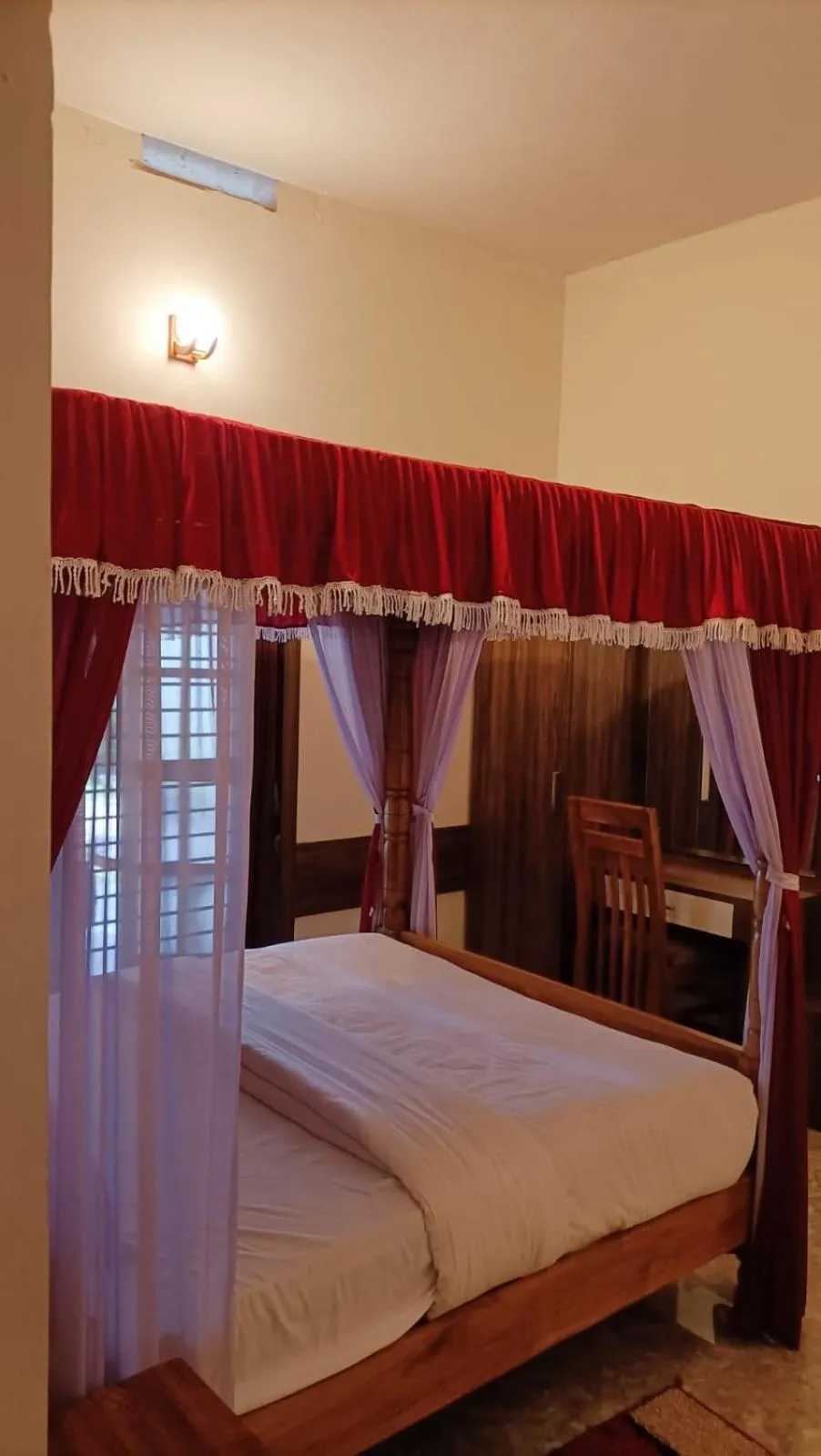 Bed in Orange Valley Plantation Holiday Coorg