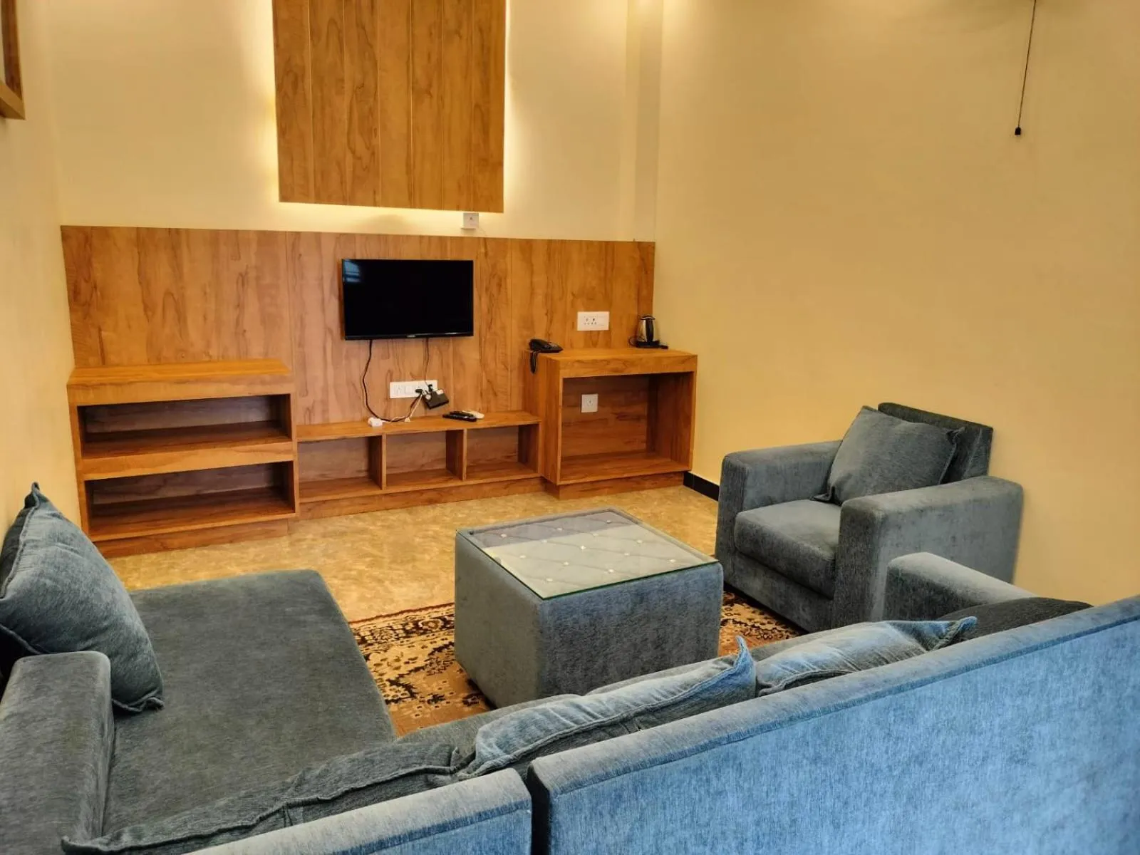 Communal lounge/ TV room in Orange Valley Plantation Holiday Coorg