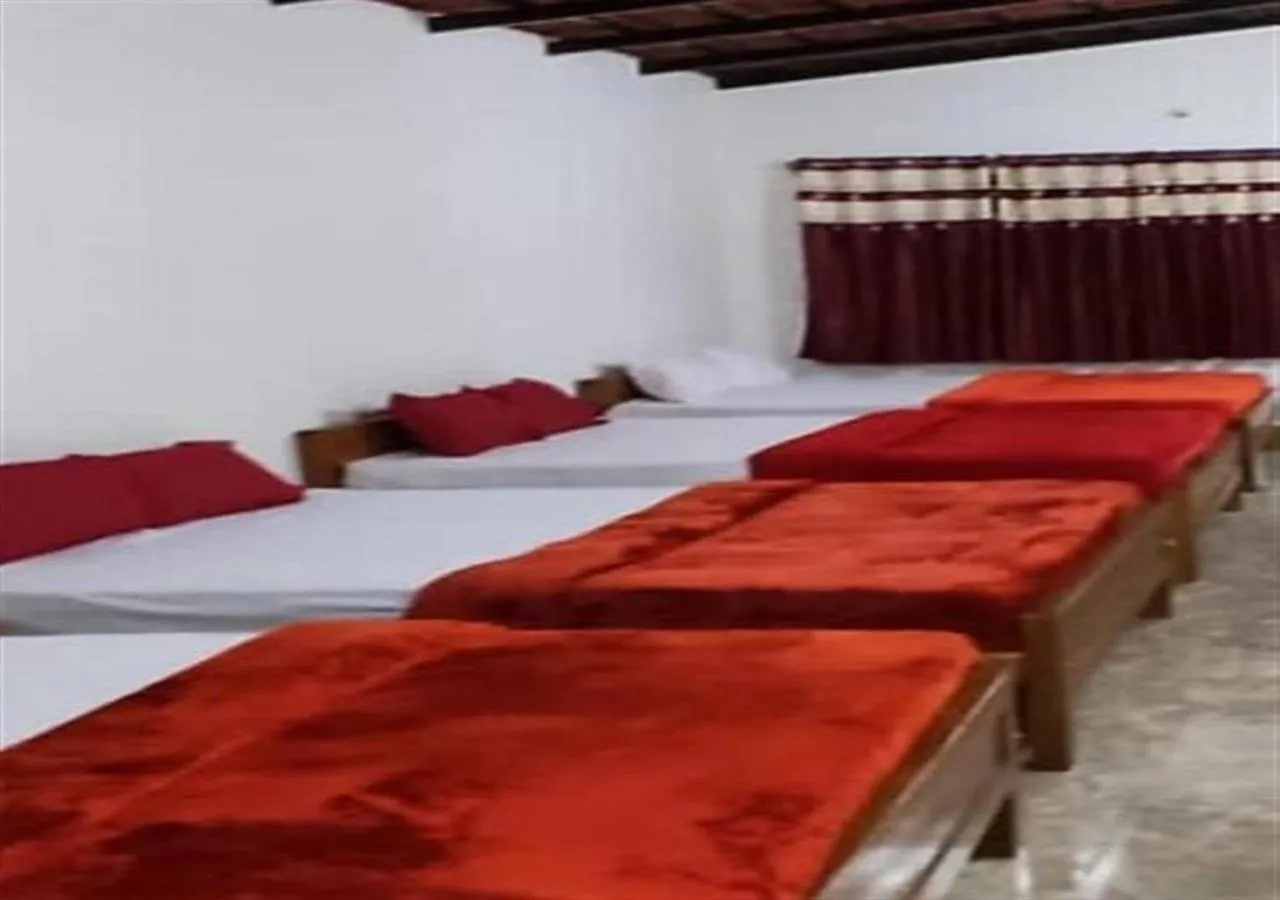 Bed in Orange Valley Plantation Holiday Coorg