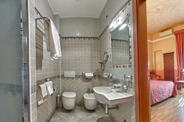 Bathroom, Bed in Hotel Pedrini