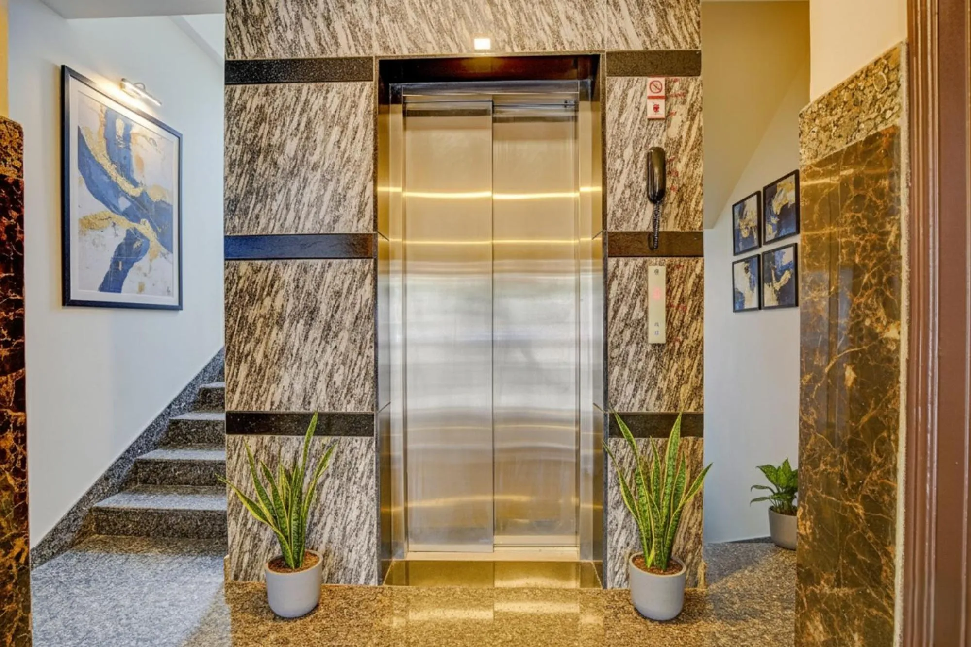 elevator in FabHotel Greenwood Xpress Inn - Nr Manipal Hospital