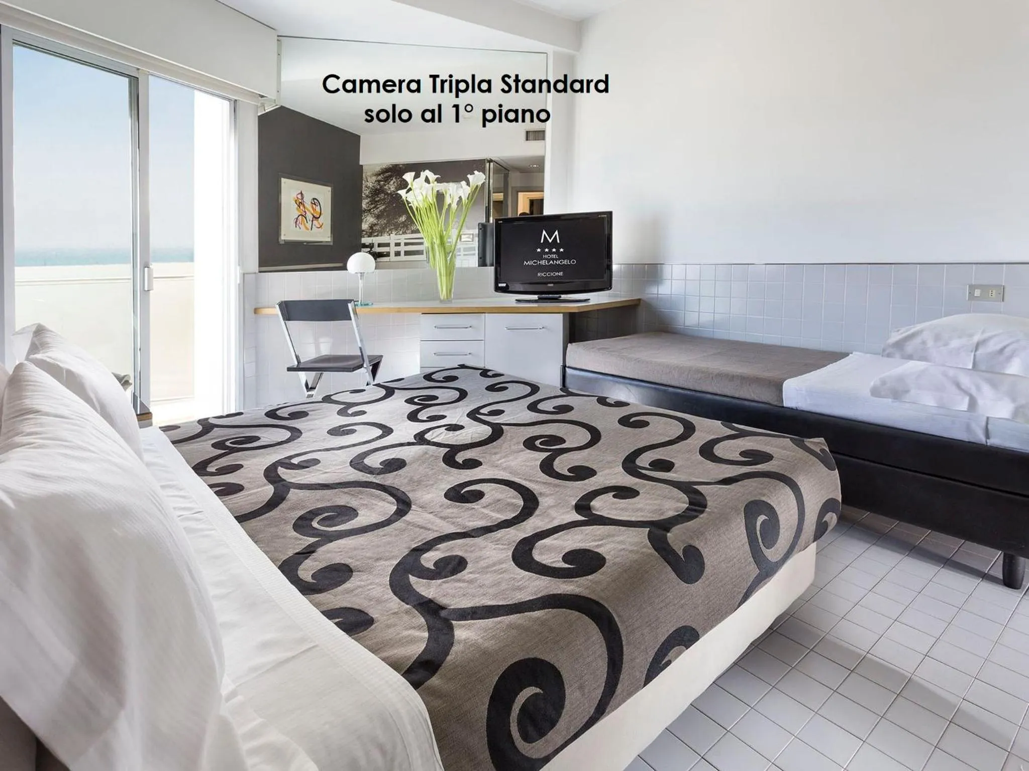 Bed in Hotel Michelangelo