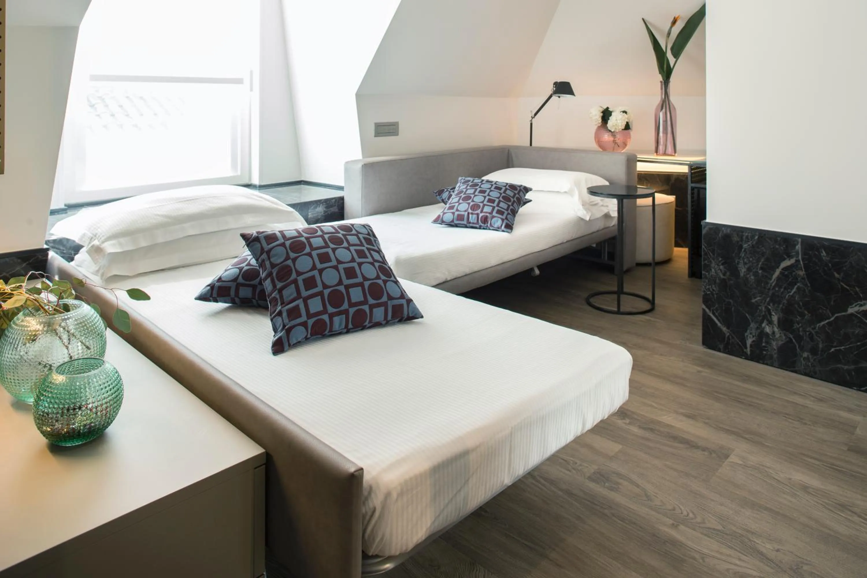 Bed in Hotel Michelangelo