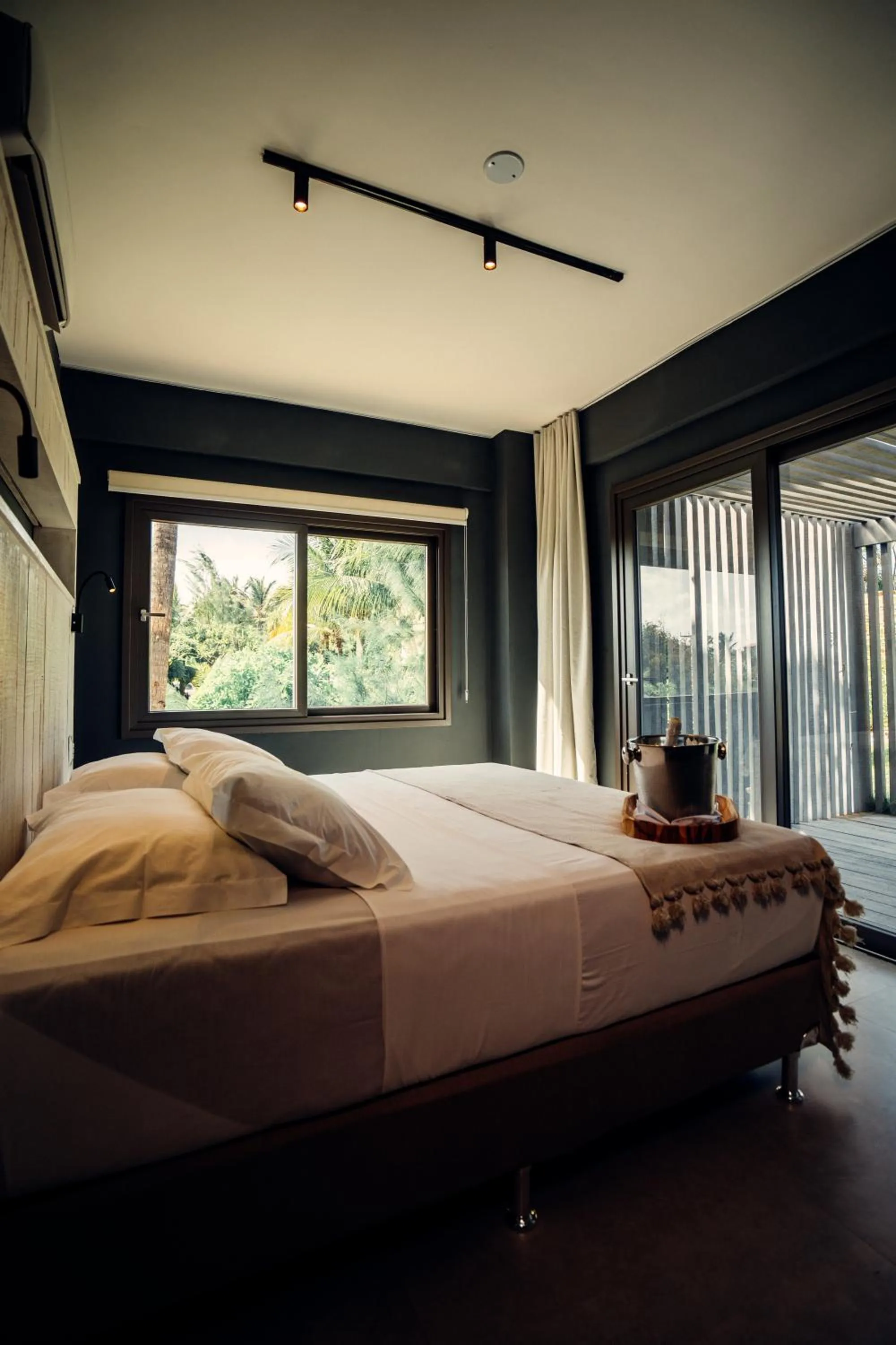 Bed in Club de Mar Condo Hotel