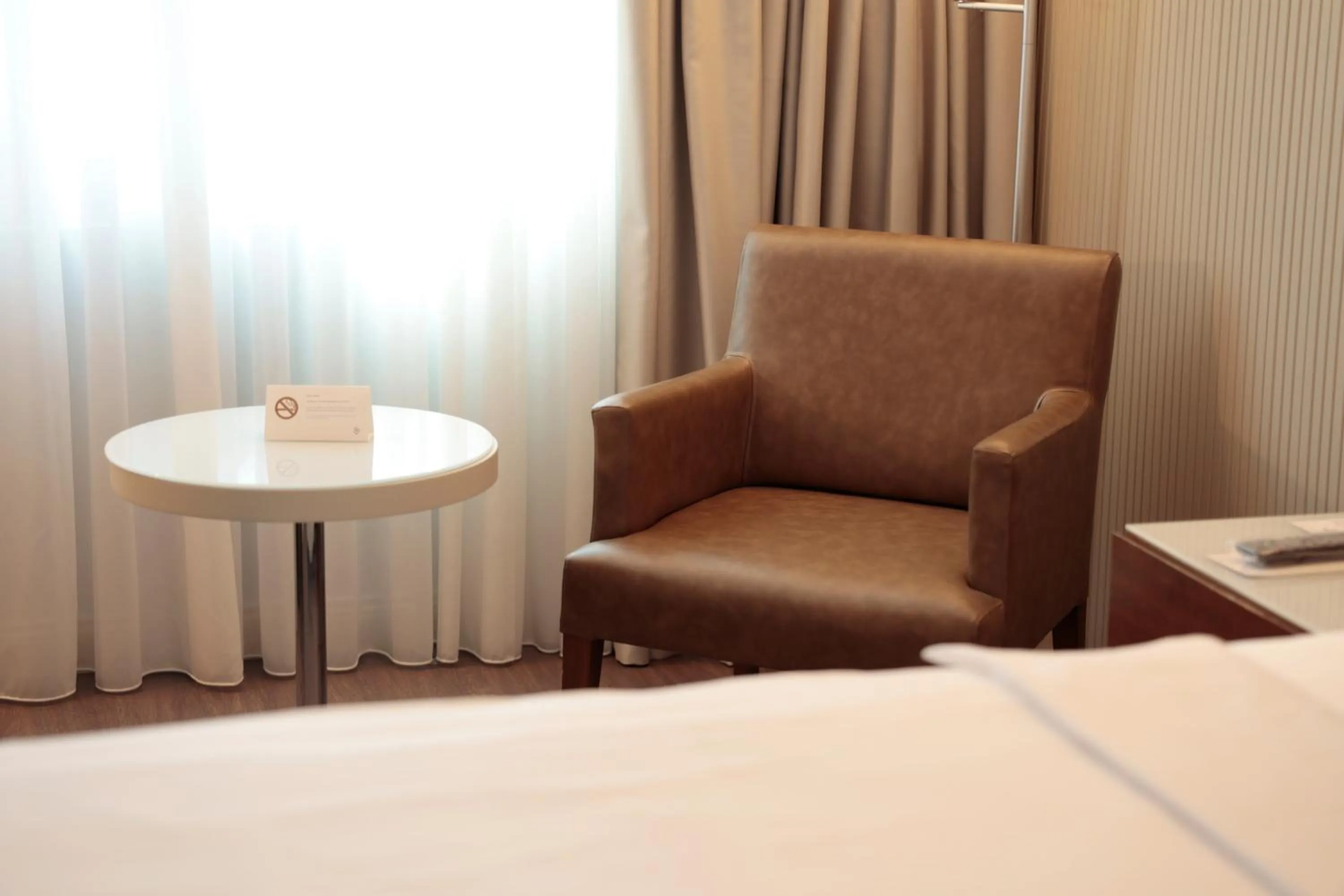 Seating area, Bed in Dedeman Istanbul