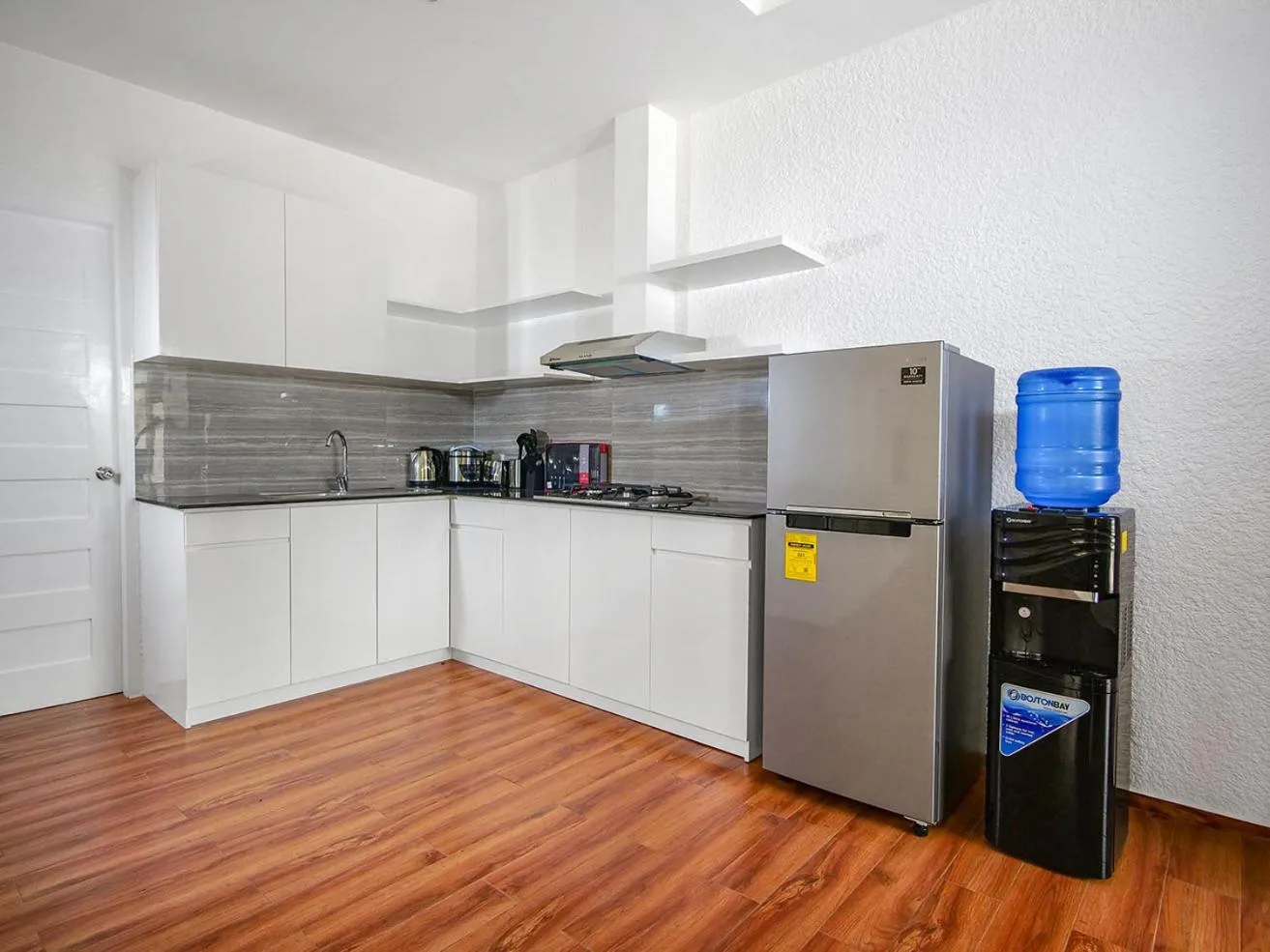 Kitchen or kitchenette in Aila Homestay