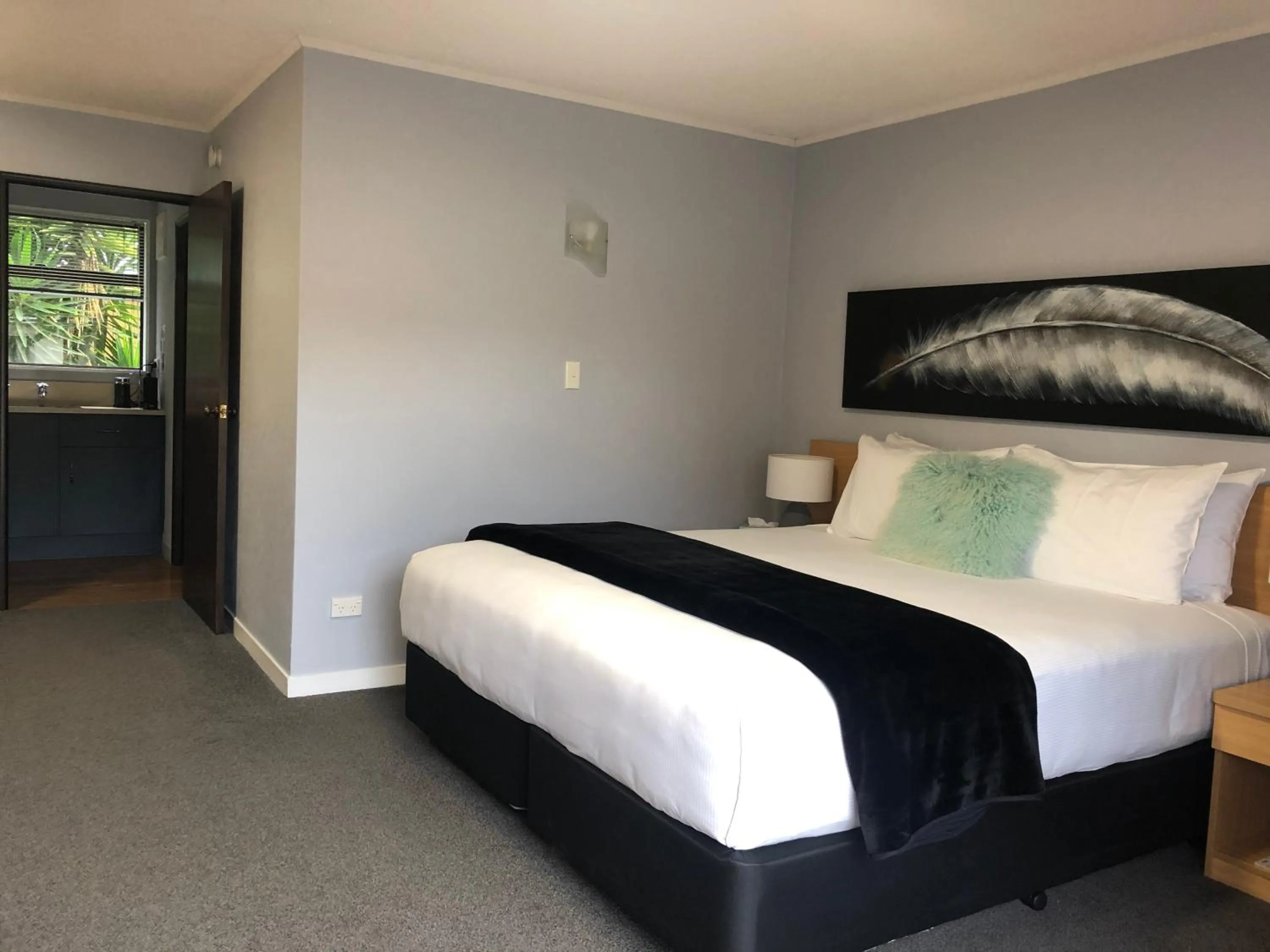 Bed in Hacienda Motor Lodge