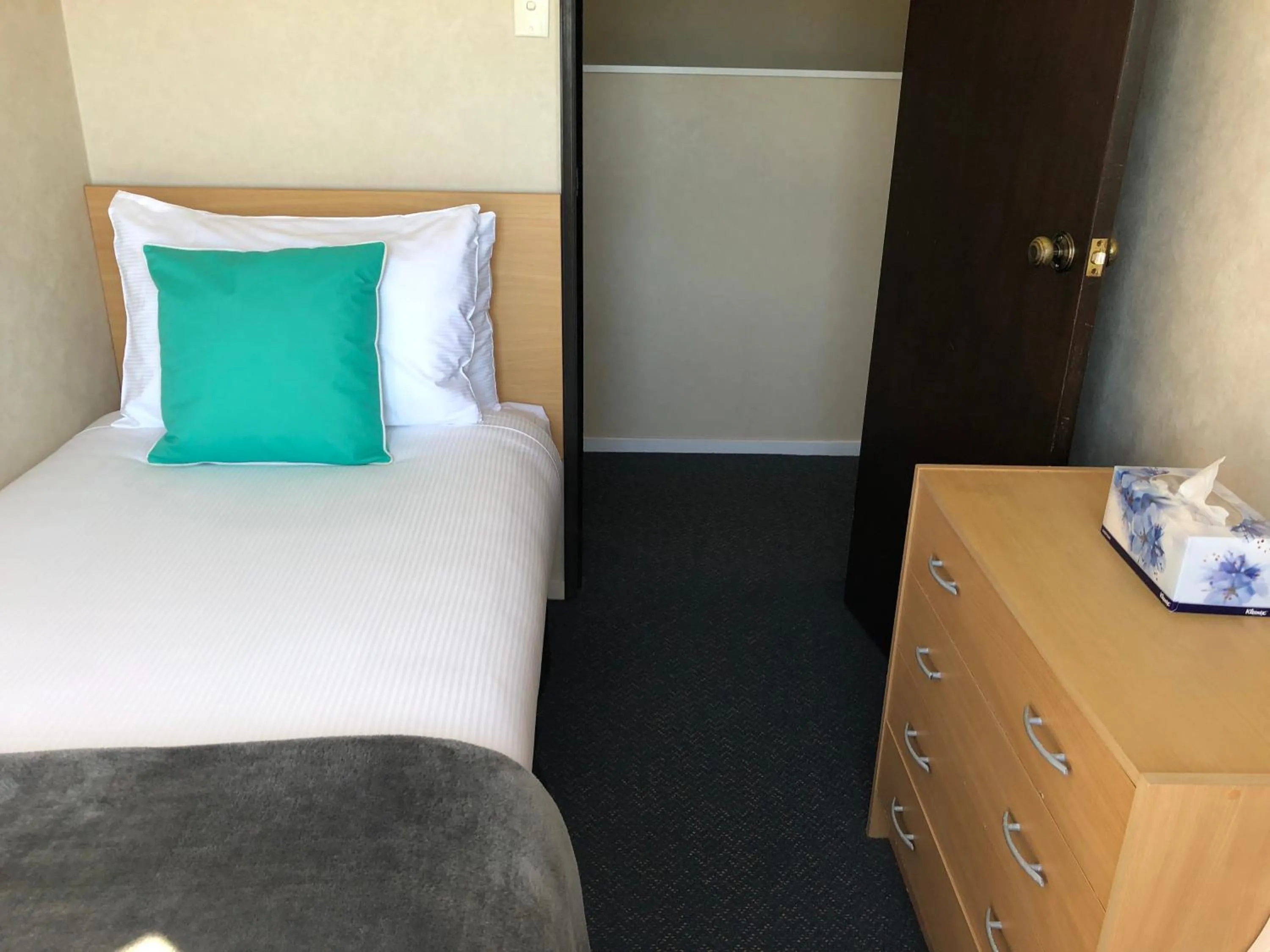 Bed in Hacienda Motor Lodge