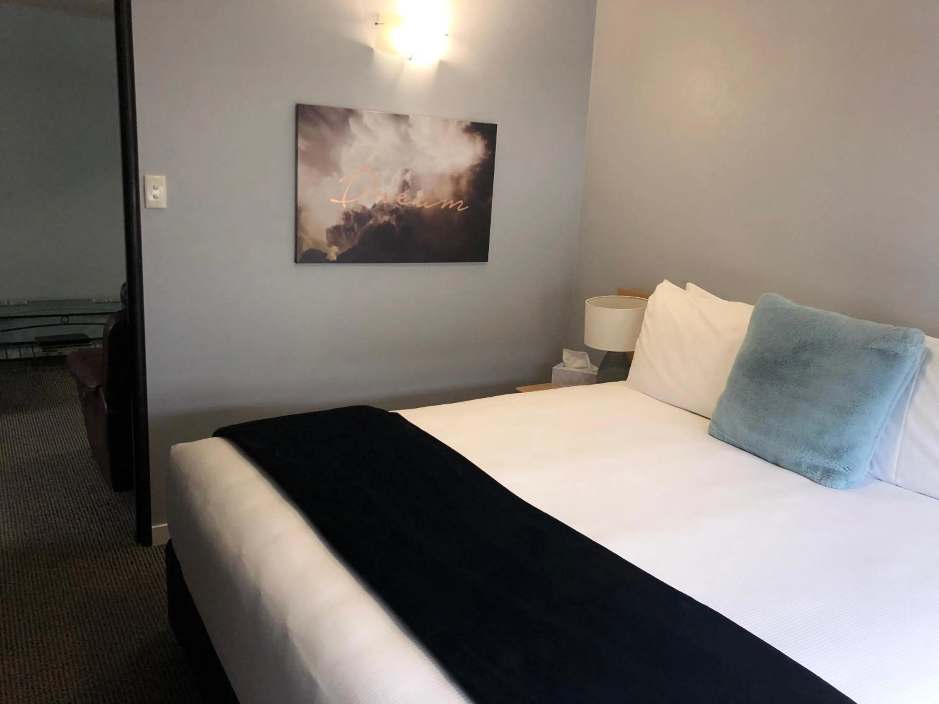 Bed in Hacienda Motor Lodge