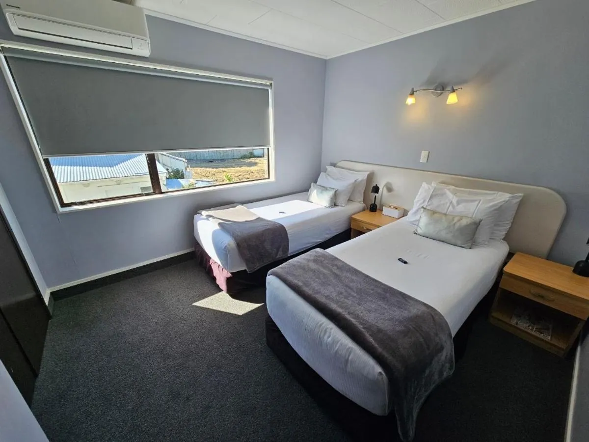 Bed in Hacienda Motor Lodge