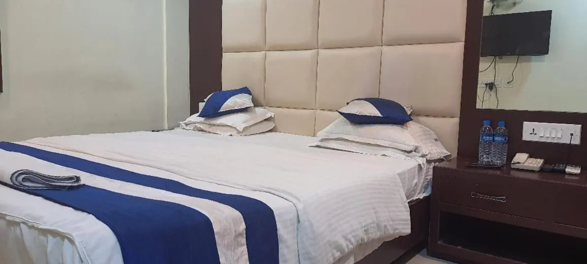 Bed in Hotel Presidency Inn