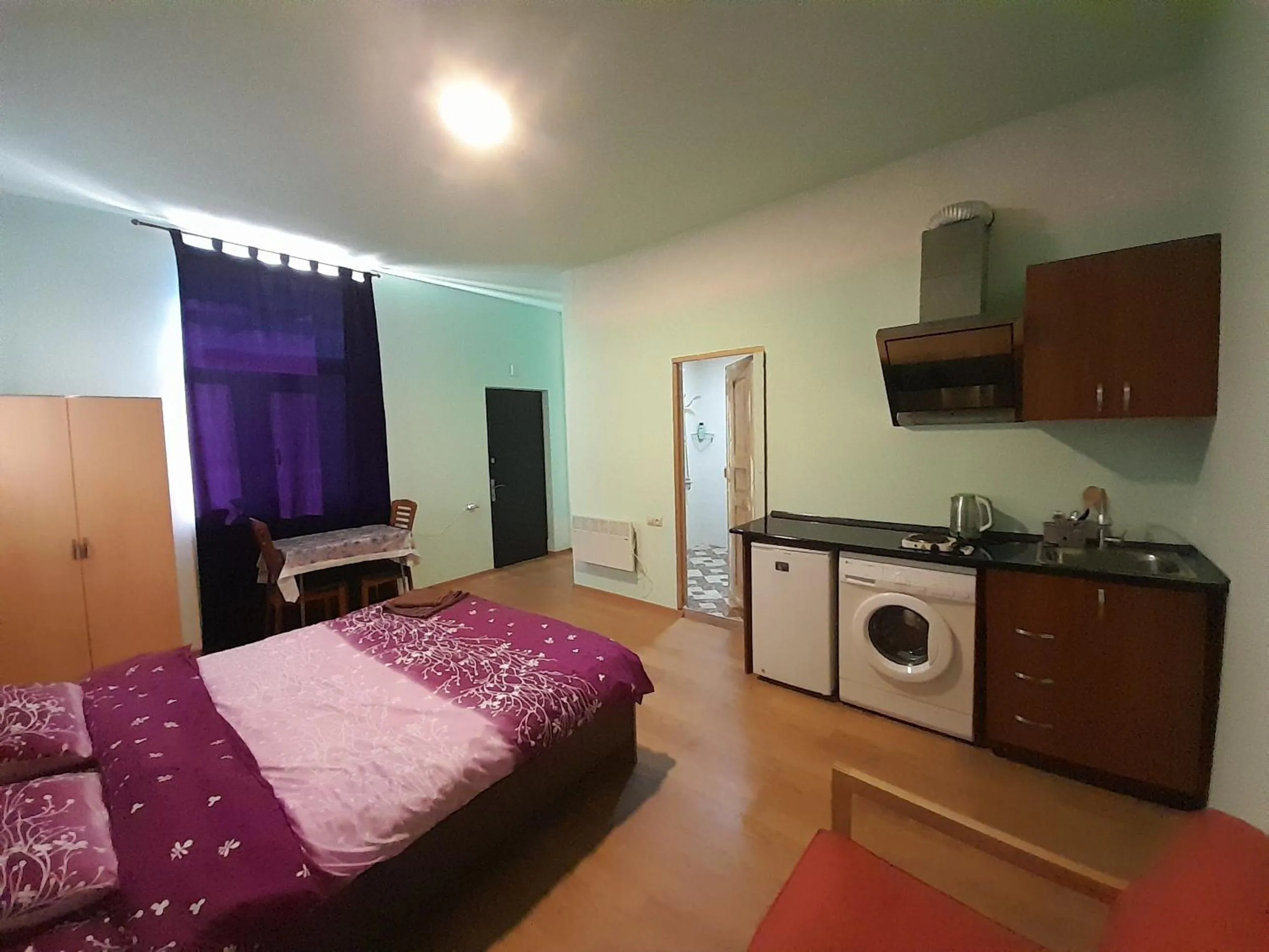 Kitchen or kitchenette, Bed in Art Guest House in KASKAD