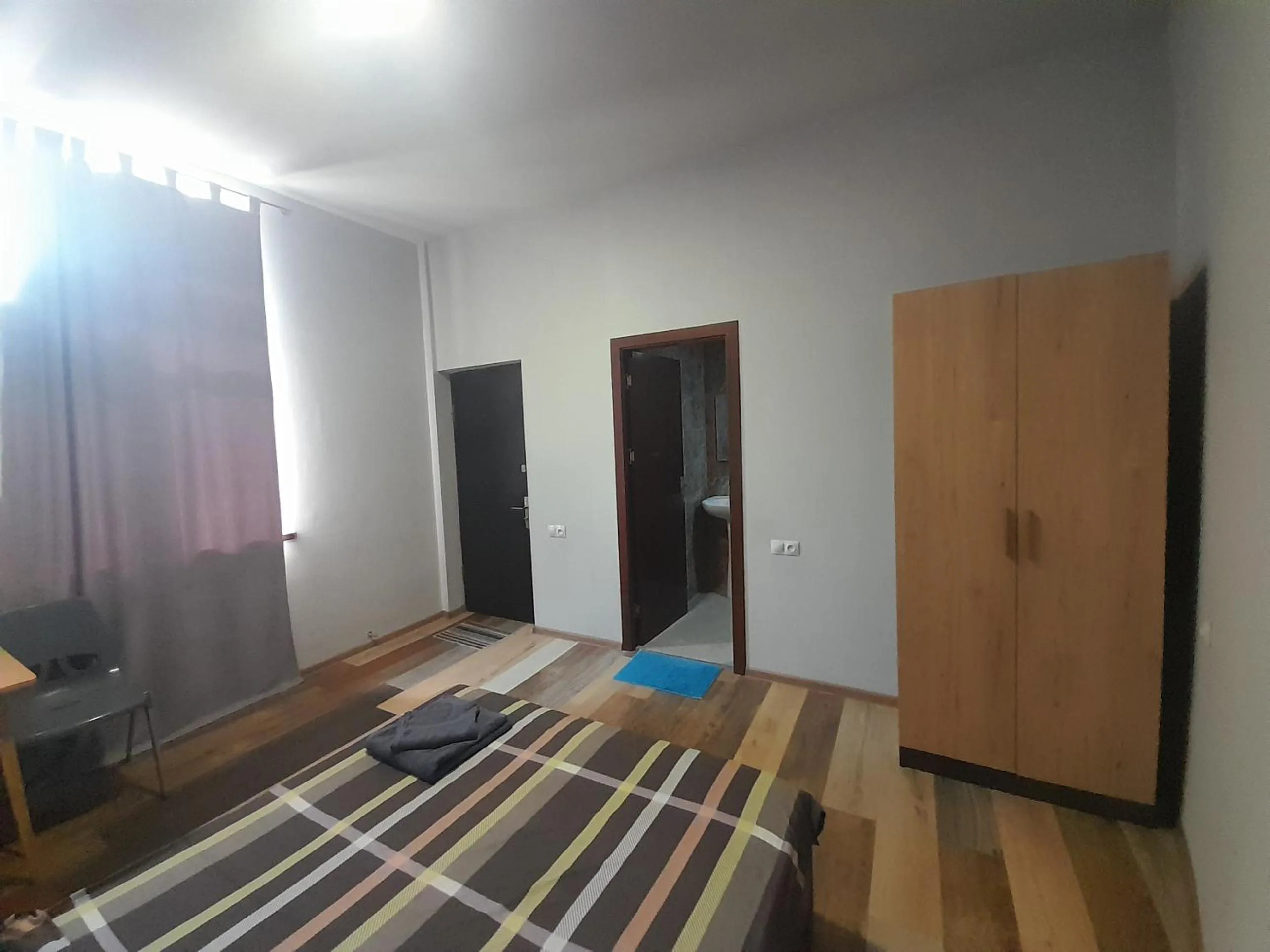 Bed in Art Guest House in KASKAD