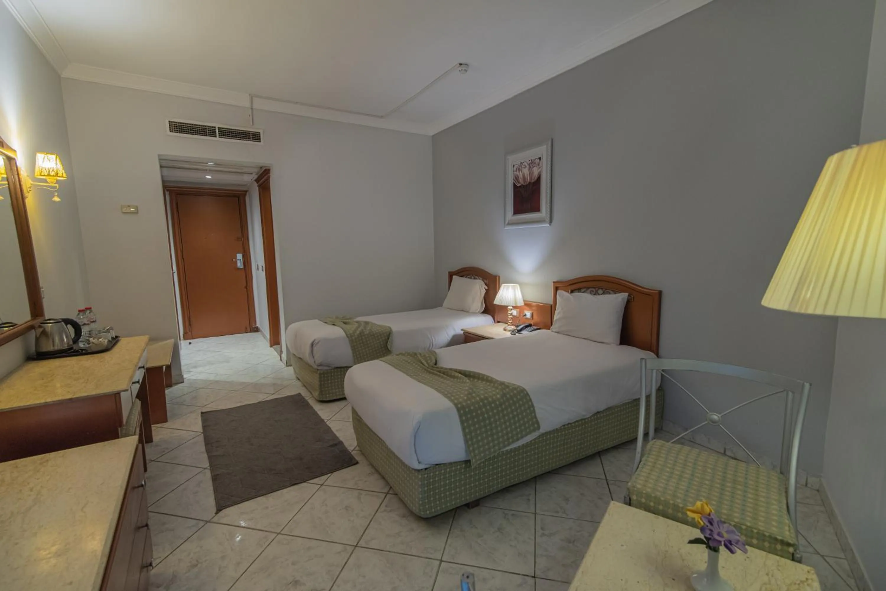 Bed in Dexon Roma Hotel