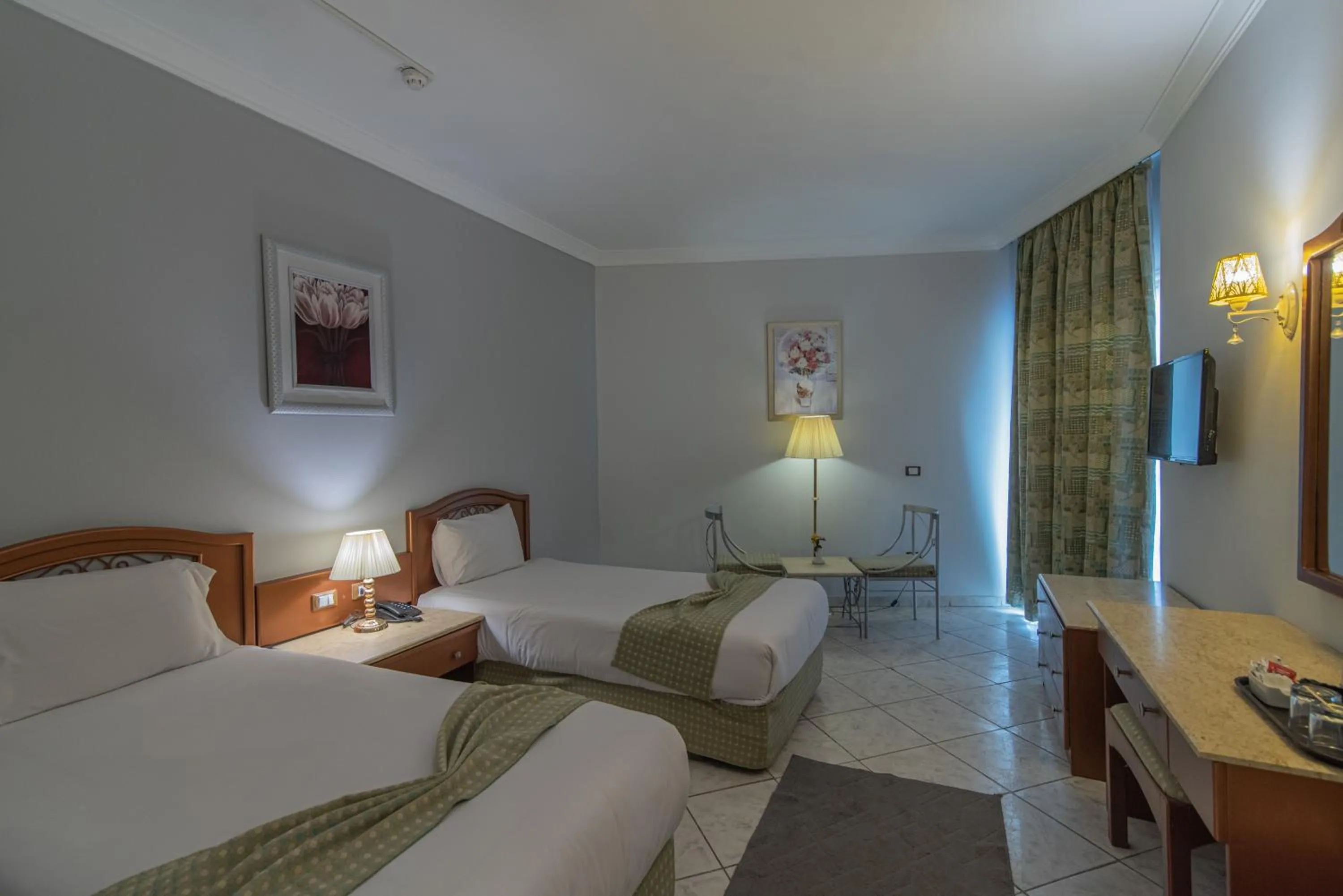 TV and multimedia, Bed in Dexon Roma Hotel