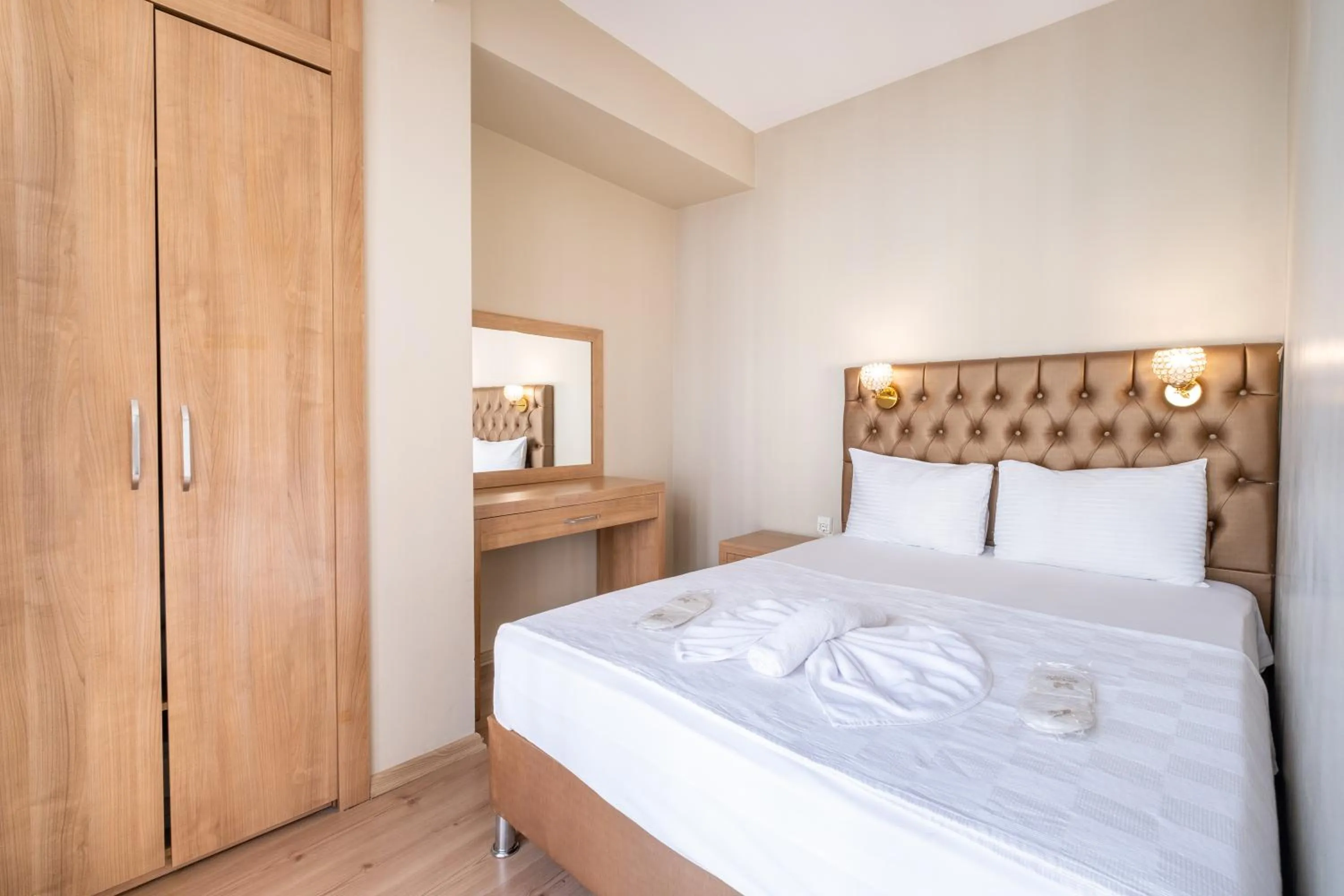 Bed in Lavin Hotel & Suites