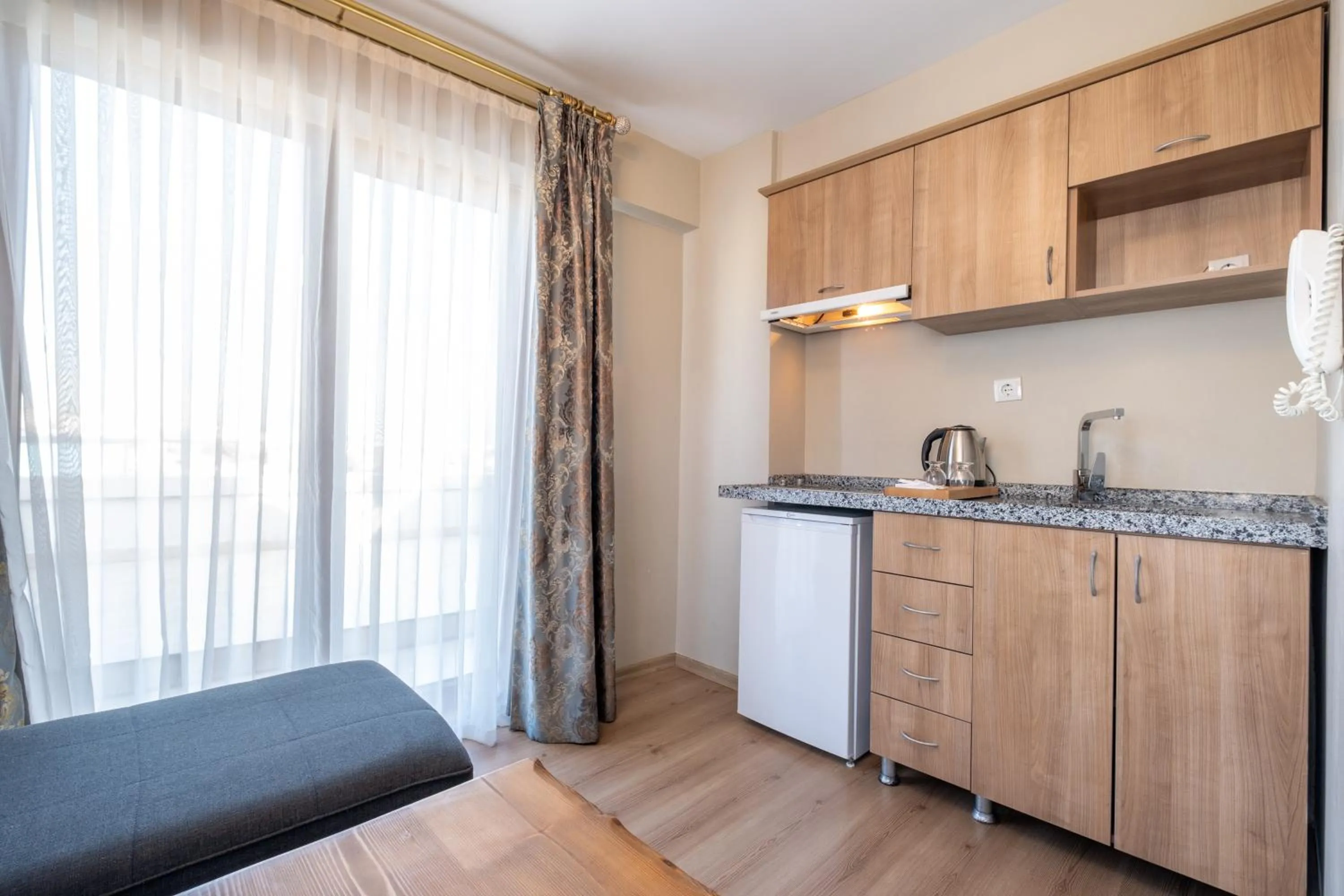 Kitchen or kitchenette in Lavin Hotel & Suites