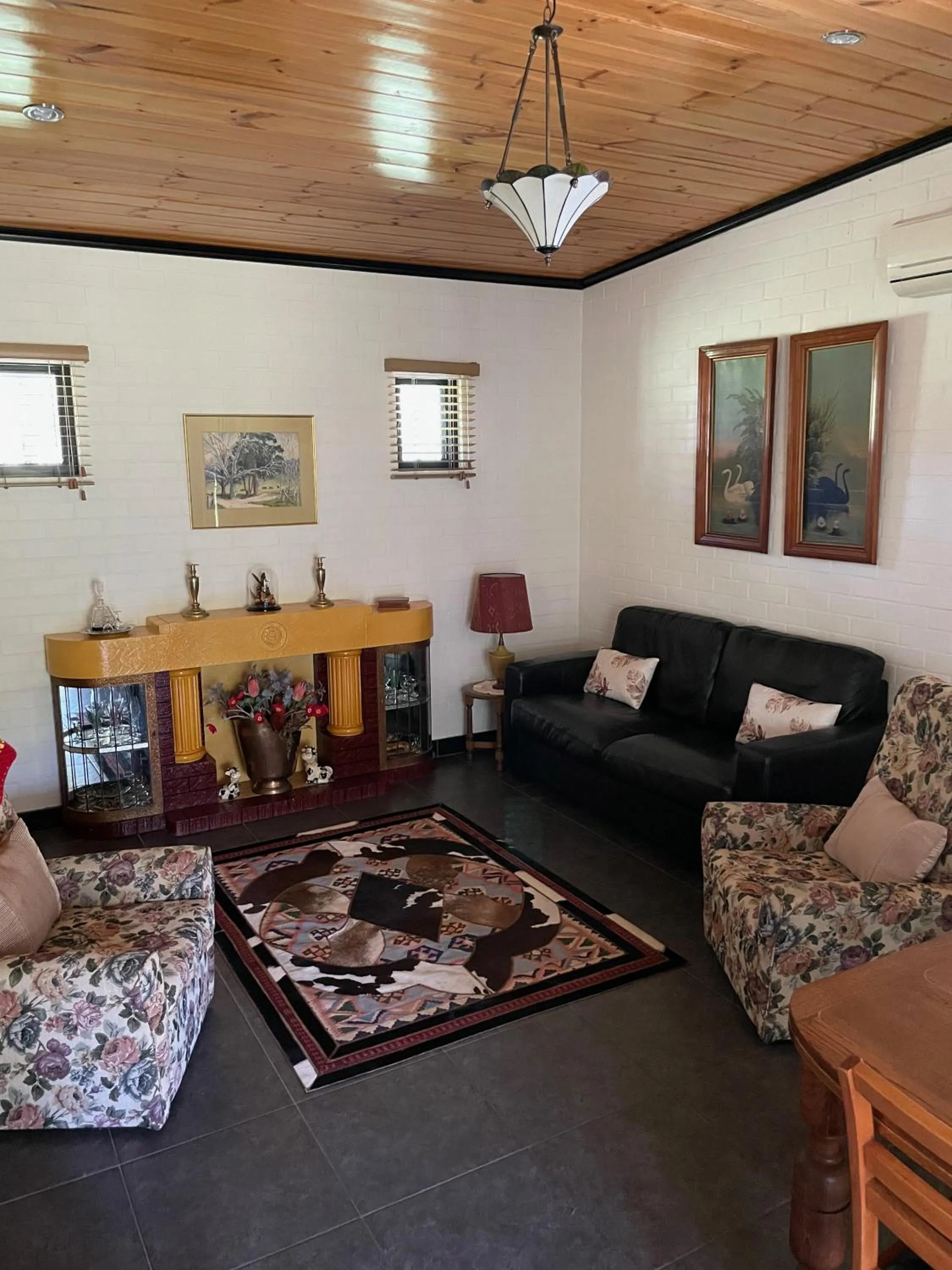 Seating area in Belvoir B&B Cottages