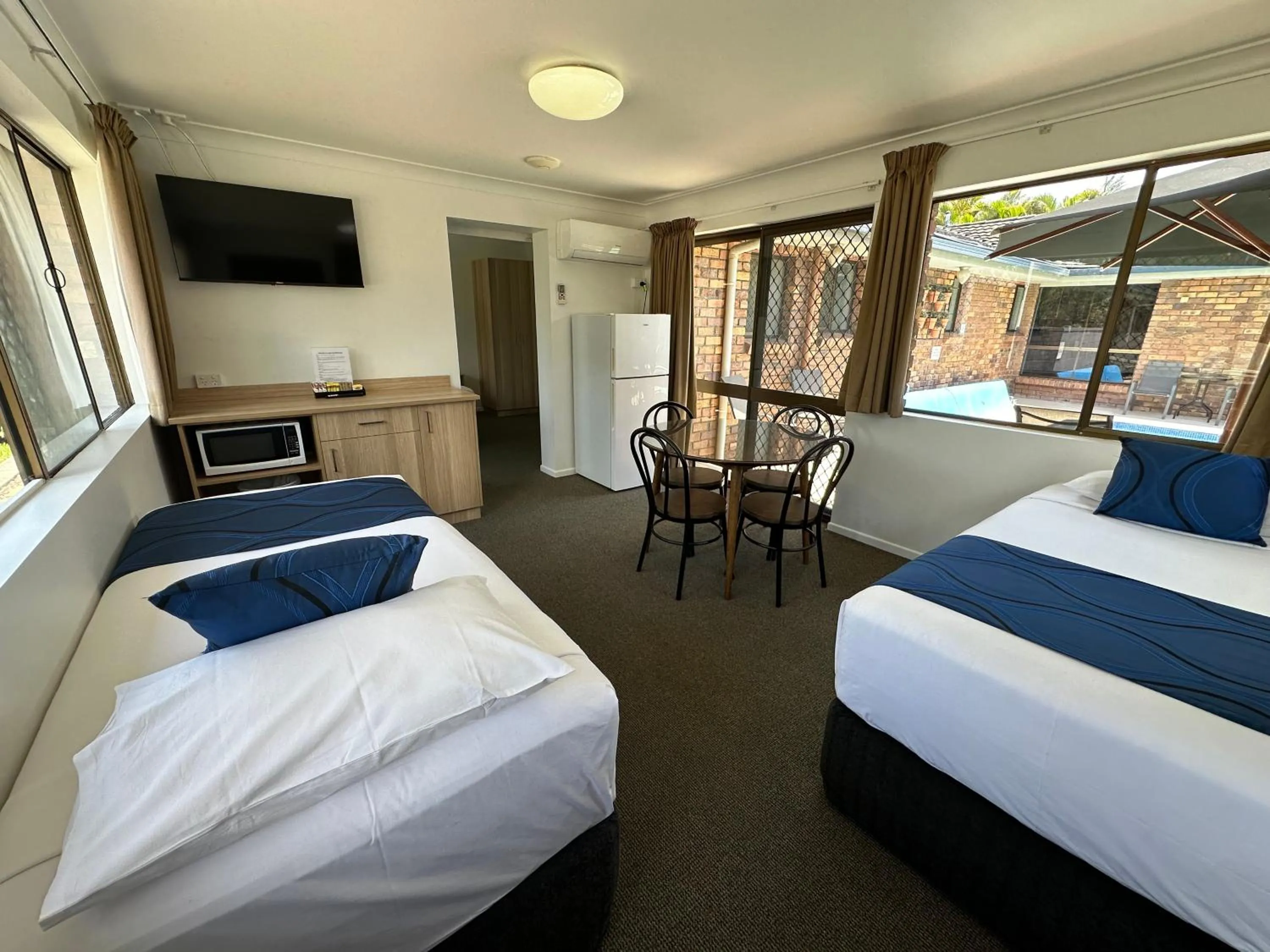 Bedroom, Bed in Logan City Motor Inn