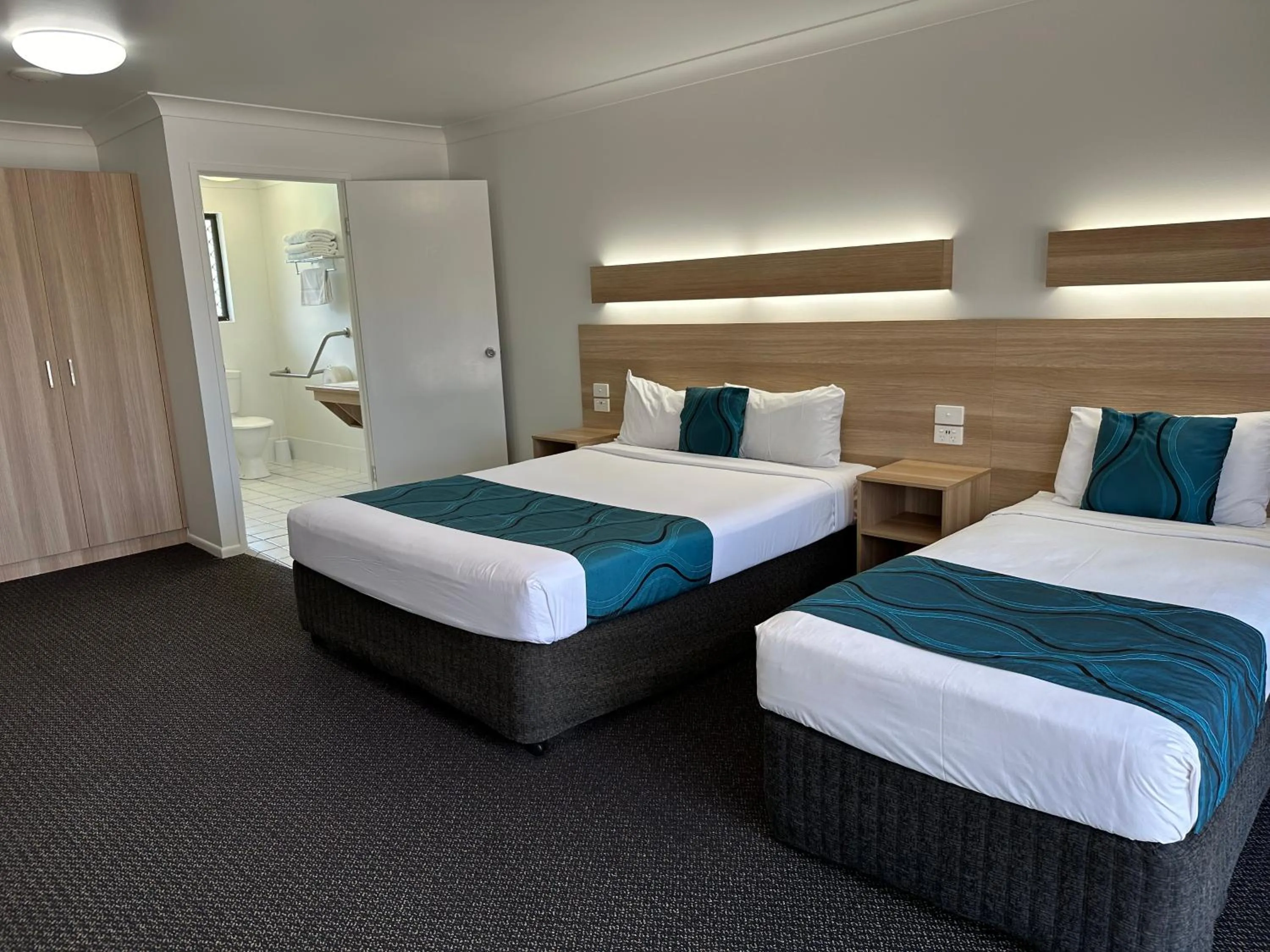 Bedroom, Bed in Logan City Motor Inn