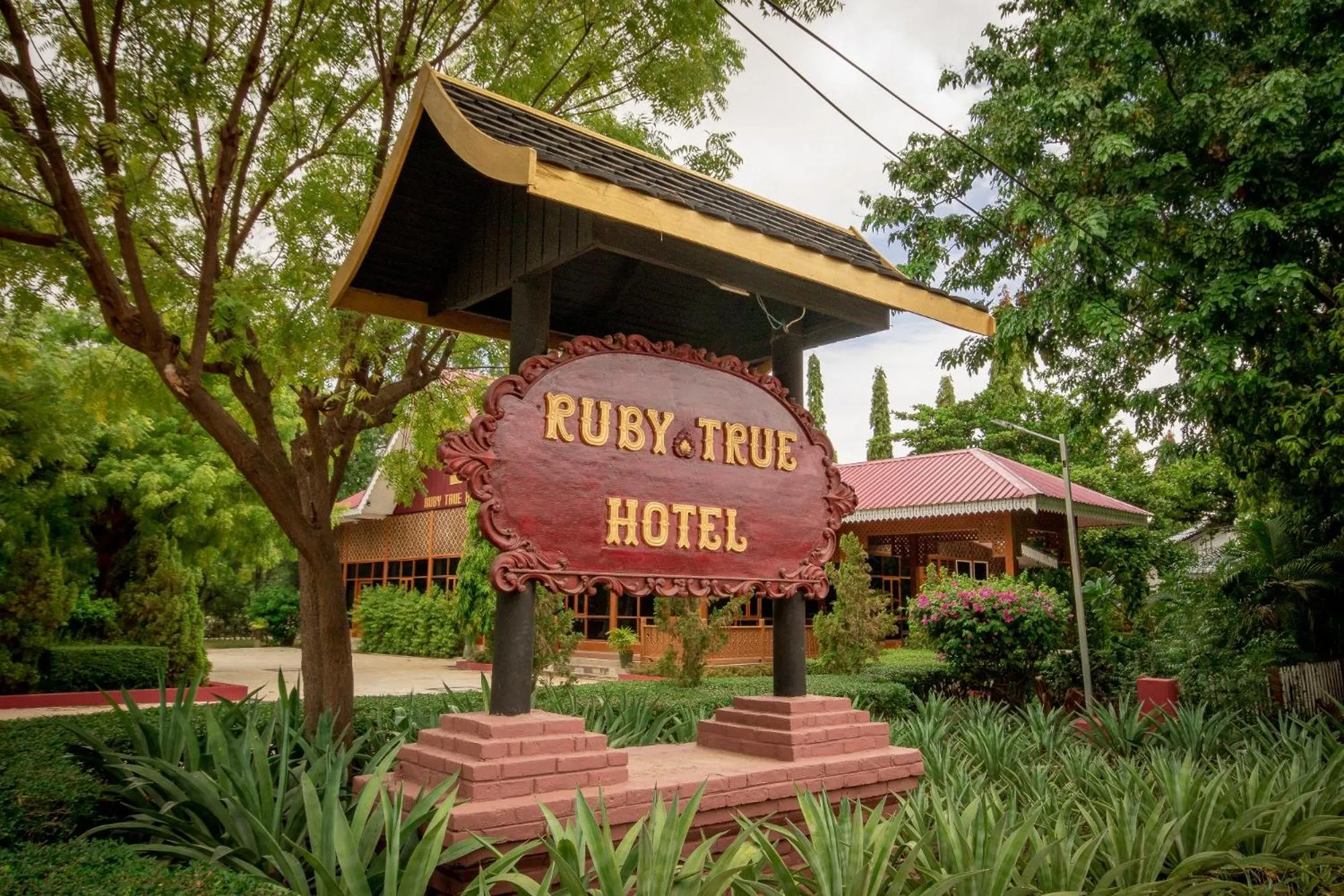 Property logo or sign in Ruby True Hotel