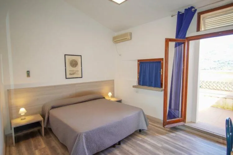 Photo of the whole room, Bed in Hotel Capo Di Stella