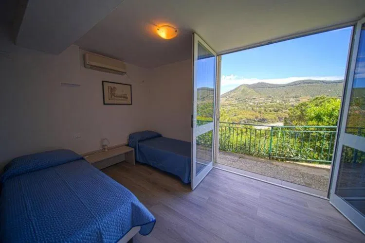 Photo of the whole room in Hotel Capo Di Stella