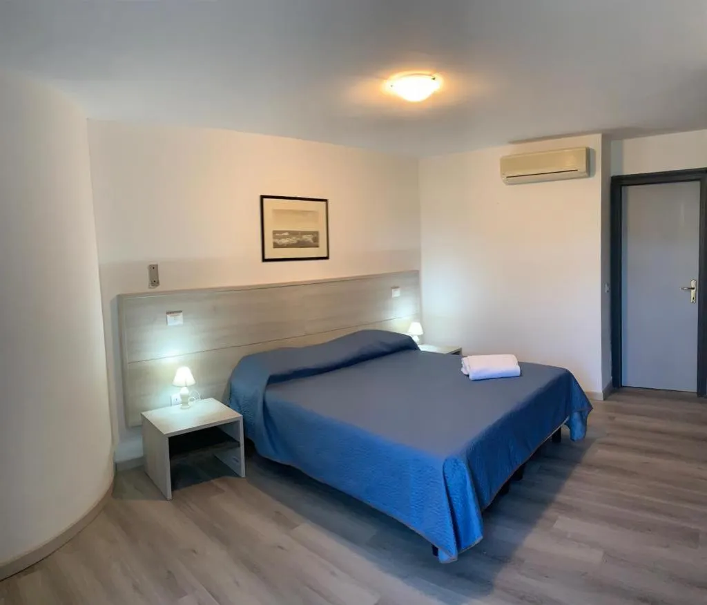 Photo of the whole room, Bed in Hotel Capo Di Stella