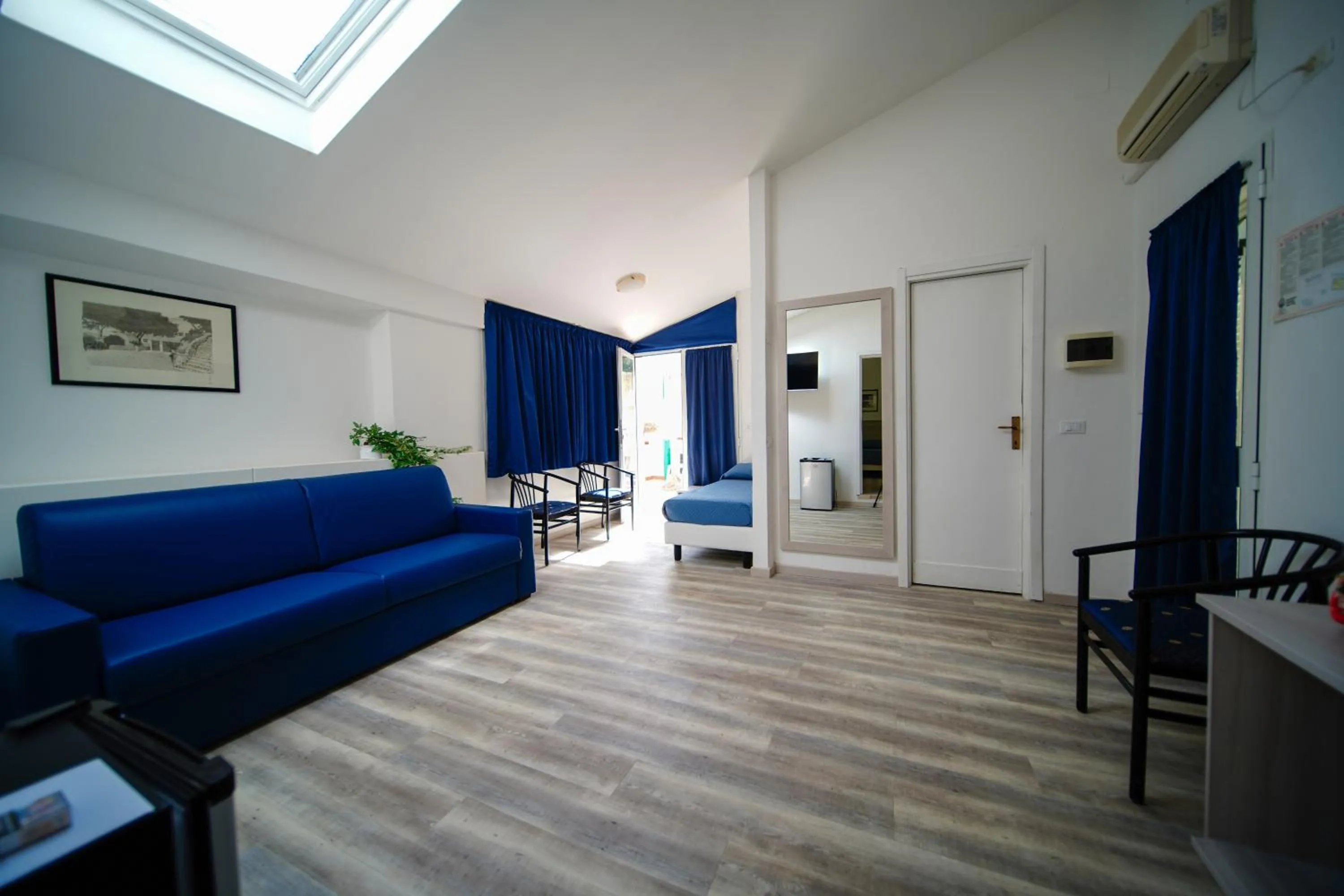 Photo of the whole room in Hotel Capo Di Stella