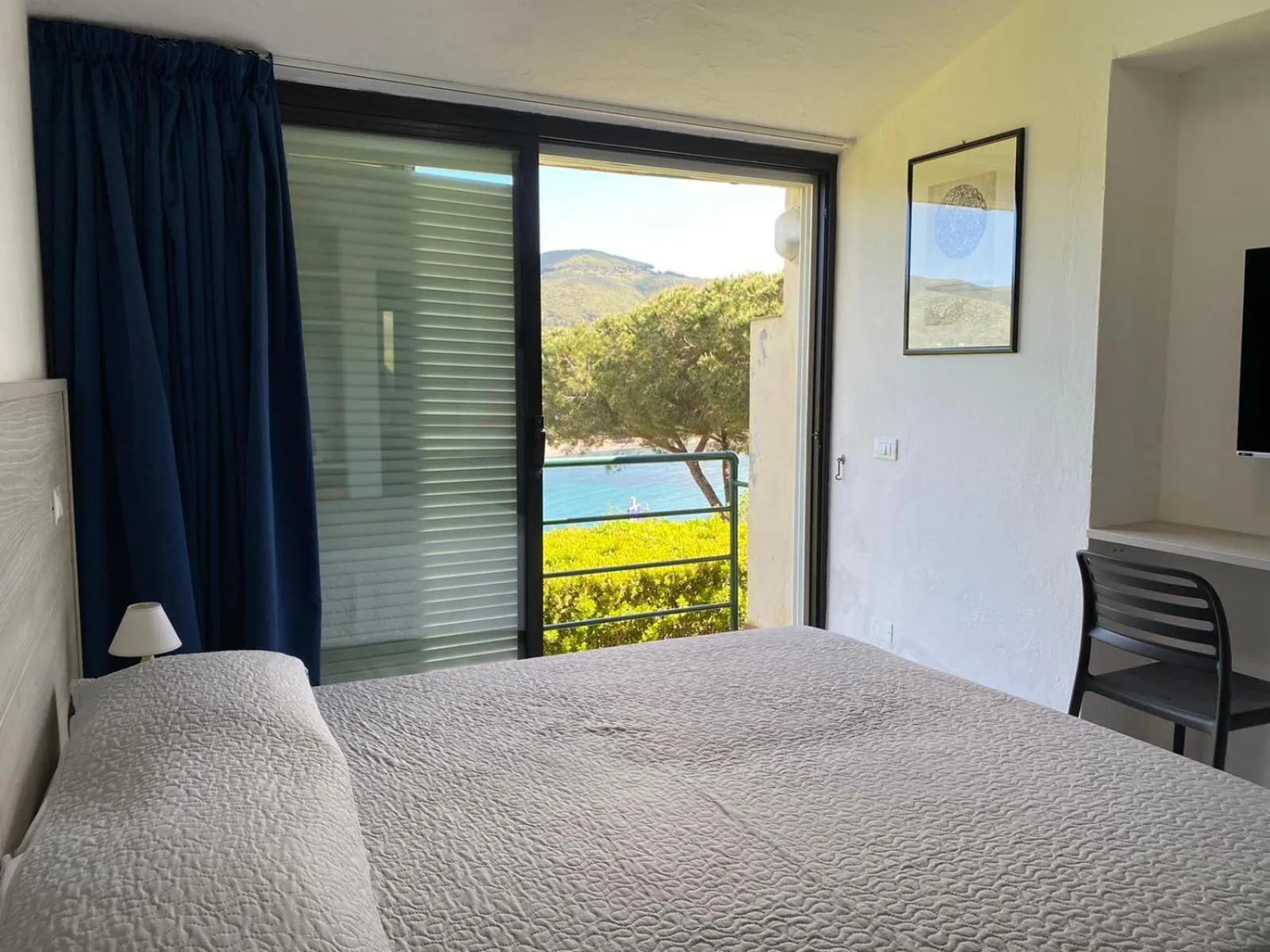 Photo of the whole room, Bed in Hotel Capo Di Stella