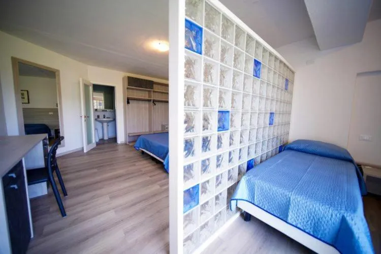 Photo of the whole room, Bed in Hotel Capo Di Stella