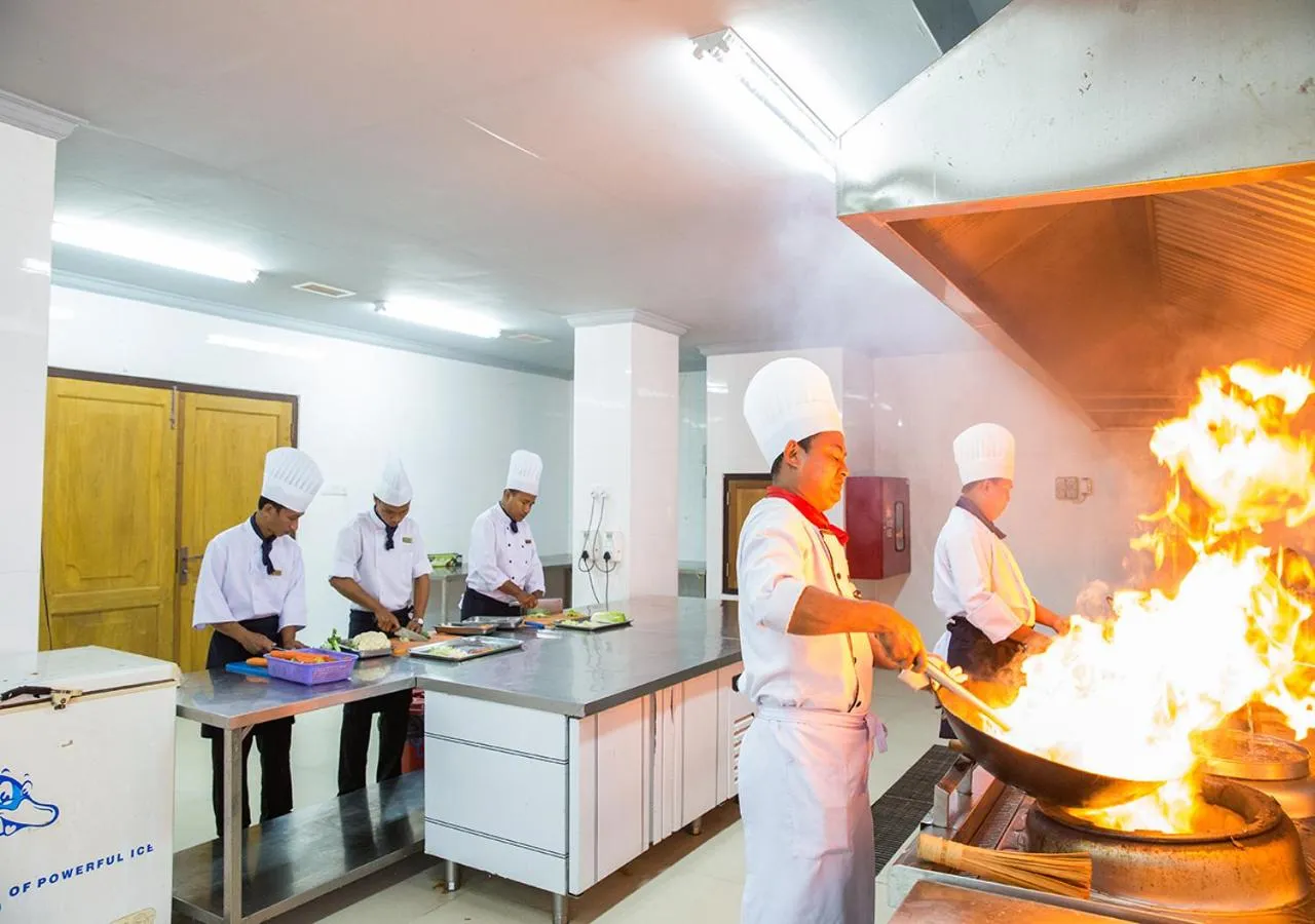 Kitchen or kitchenette in KMA NAYPYITAW Hotel