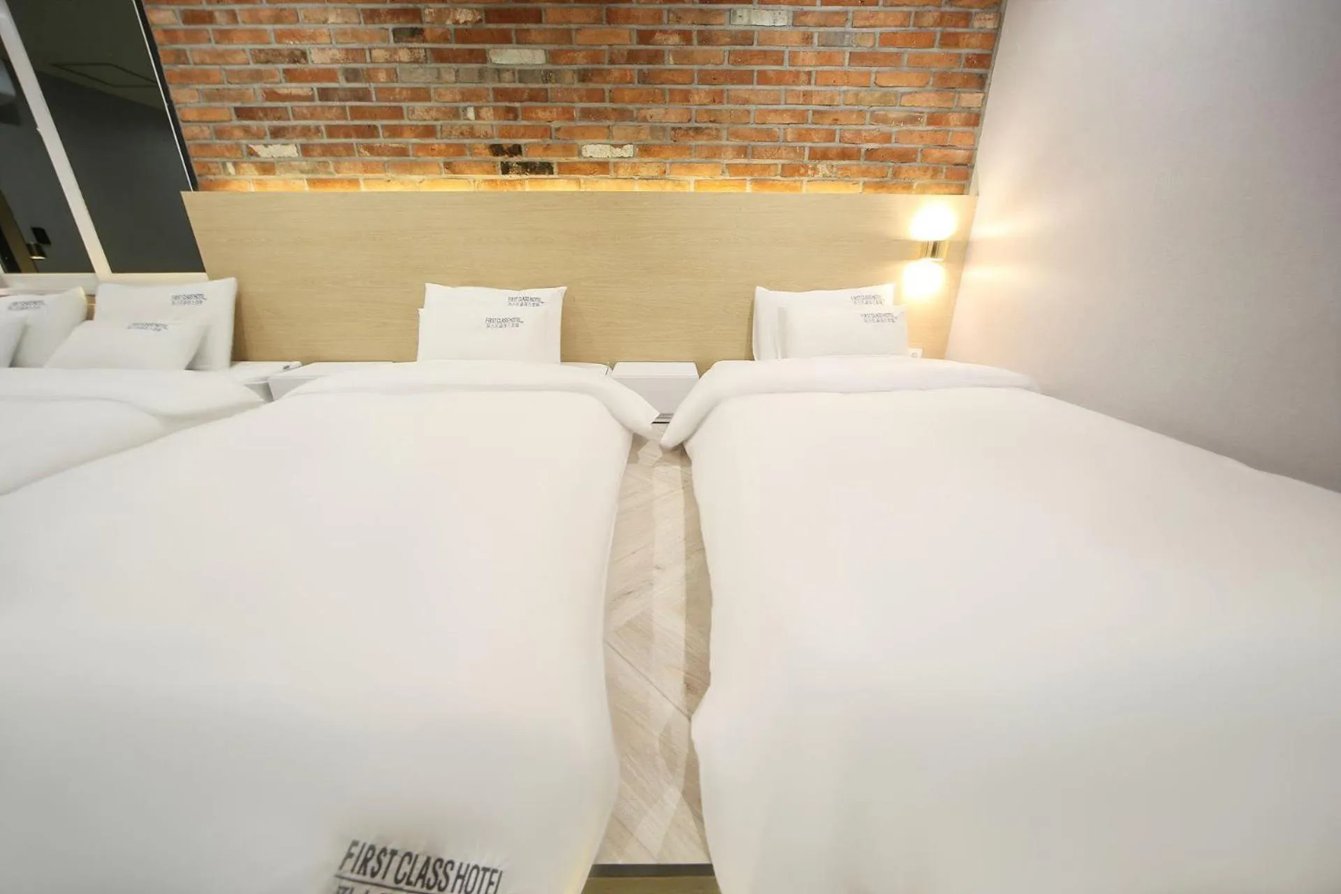 Bed in Masan First Class Hotel