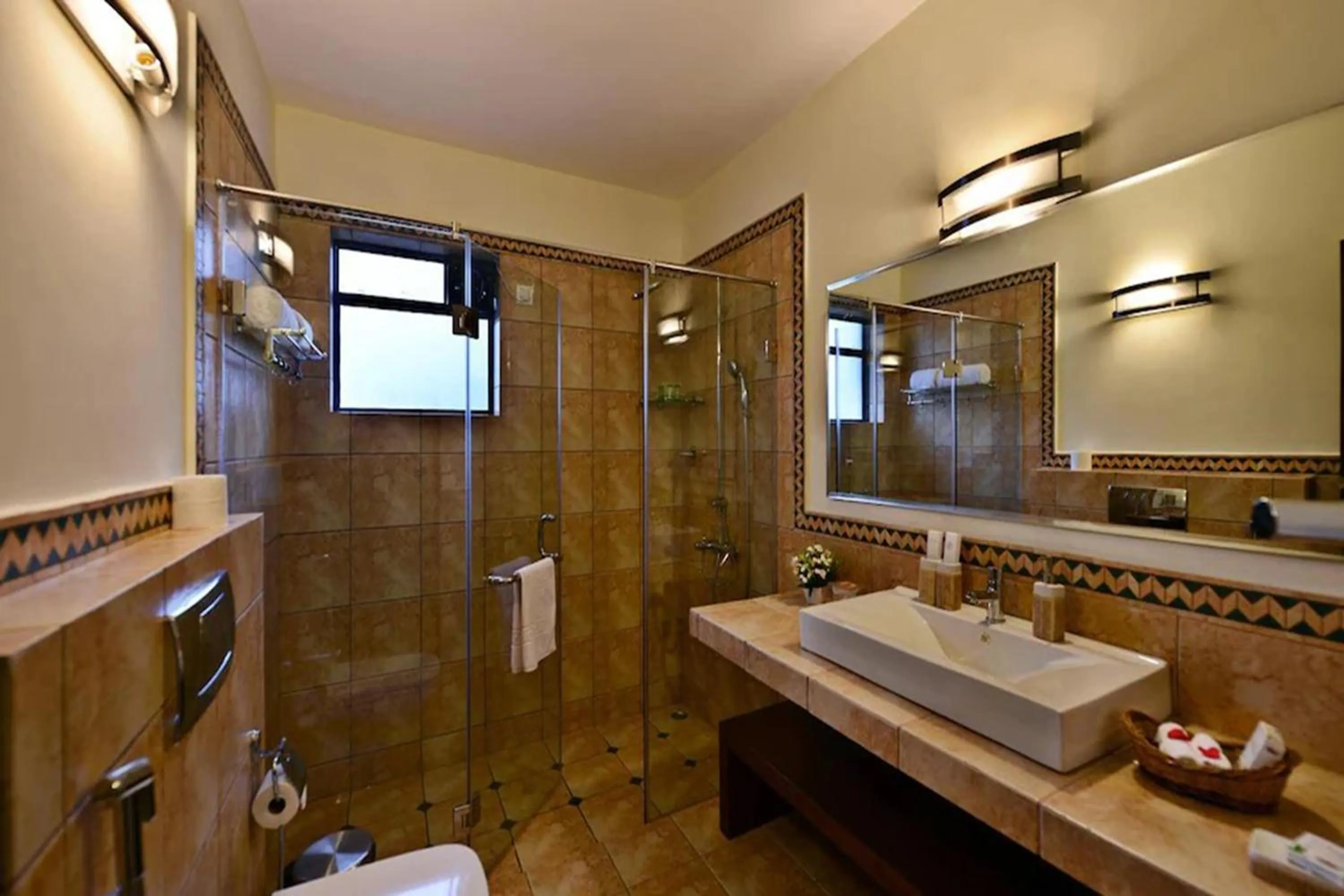 Bathroom in La Sunila suites Baga by WSI