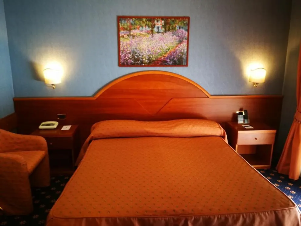 Bed in Hotel Lido - Beach and Palace