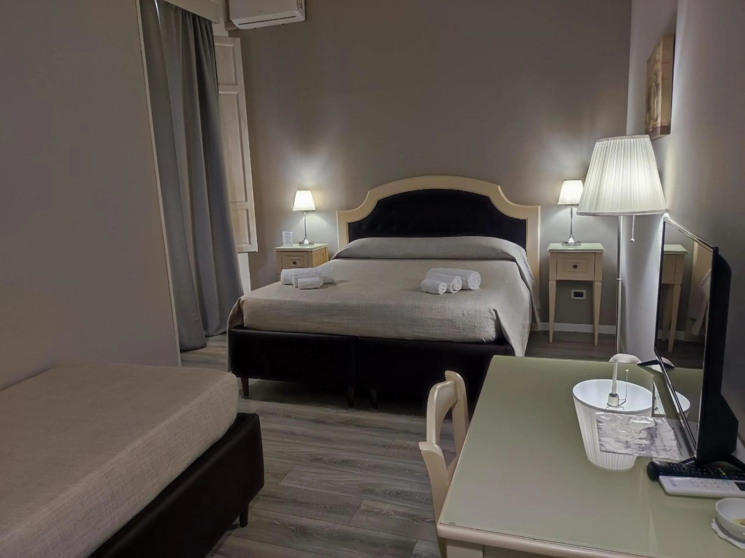 Bed in La Collegiata Guest House