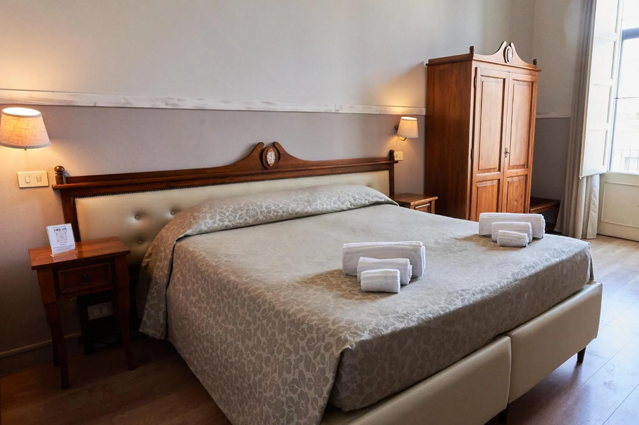 Bed in La Collegiata Guest House