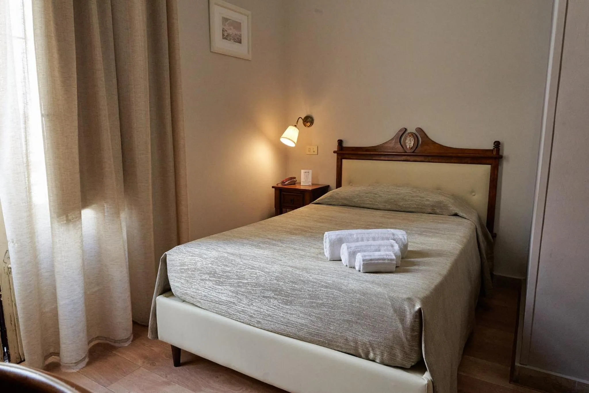 Bed in La Collegiata Guest House