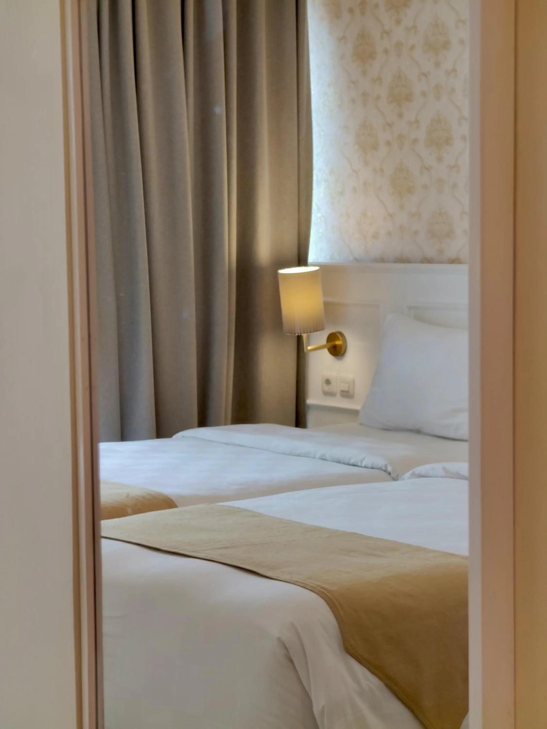 Bed in The Cube Hotel Malioboro, Azana Hotels Collection