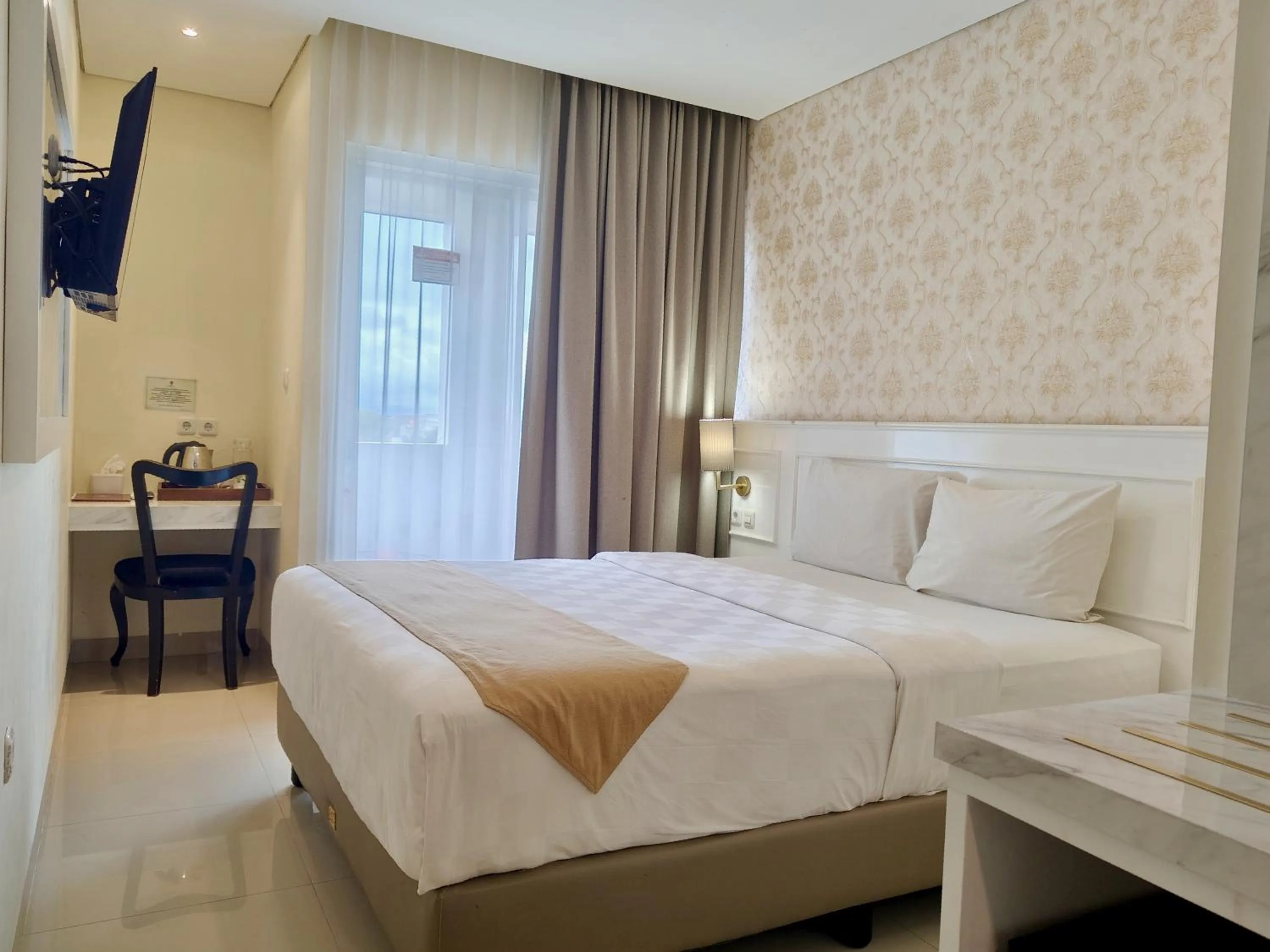 Bed in The Cube Hotel Malioboro, Azana Hotels Collection