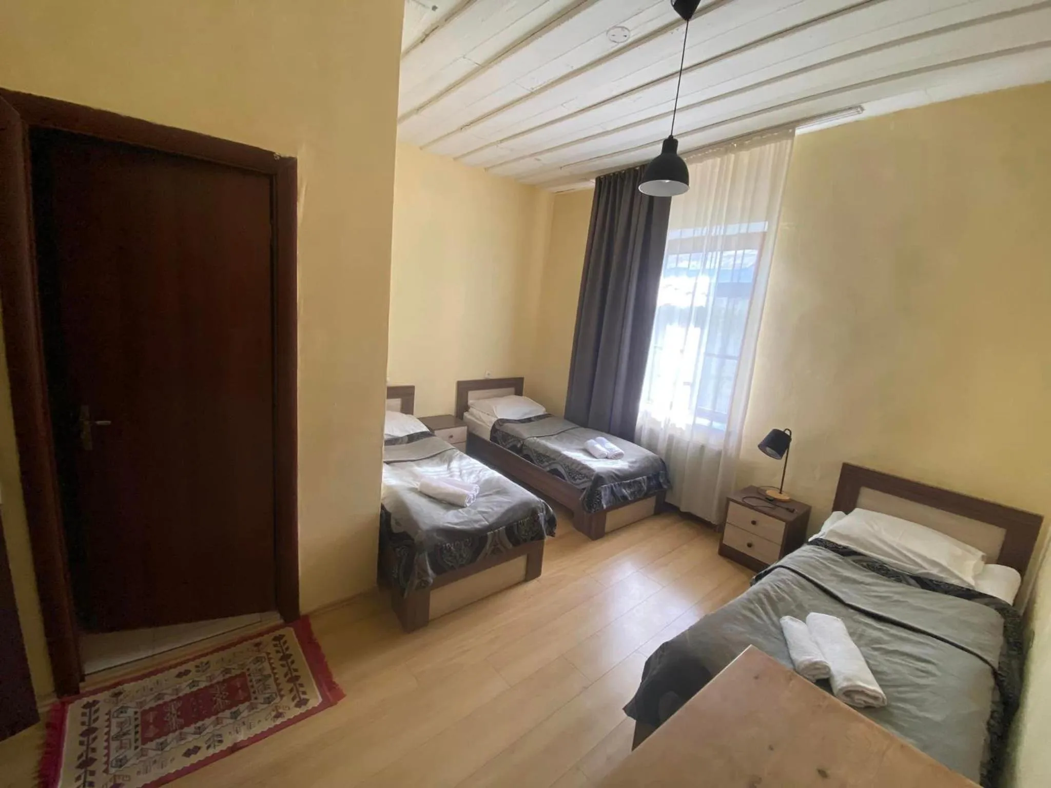 Bed in Villa Mestia Hotel