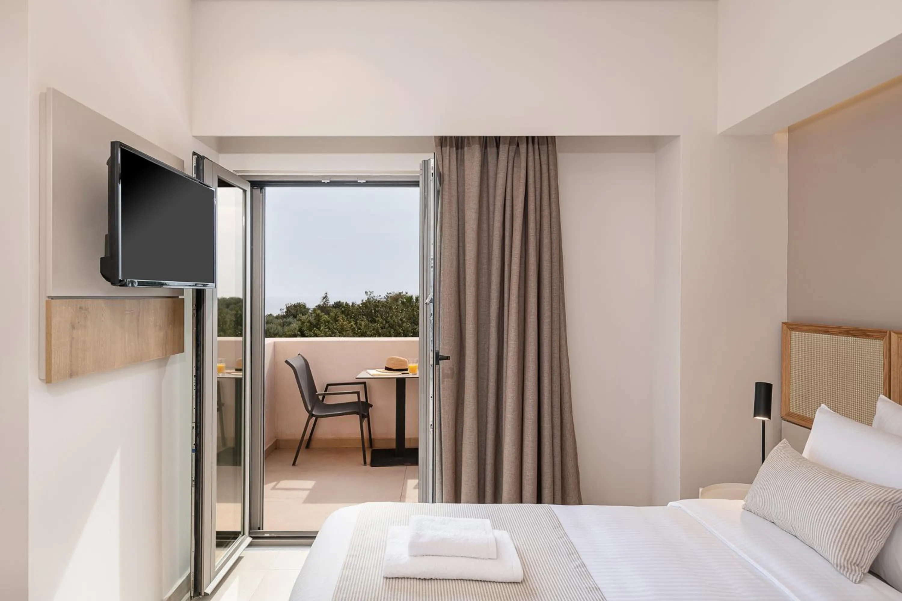 Balcony/Terrace, Bed in Elafonisi Resort by Kalomirakis Family