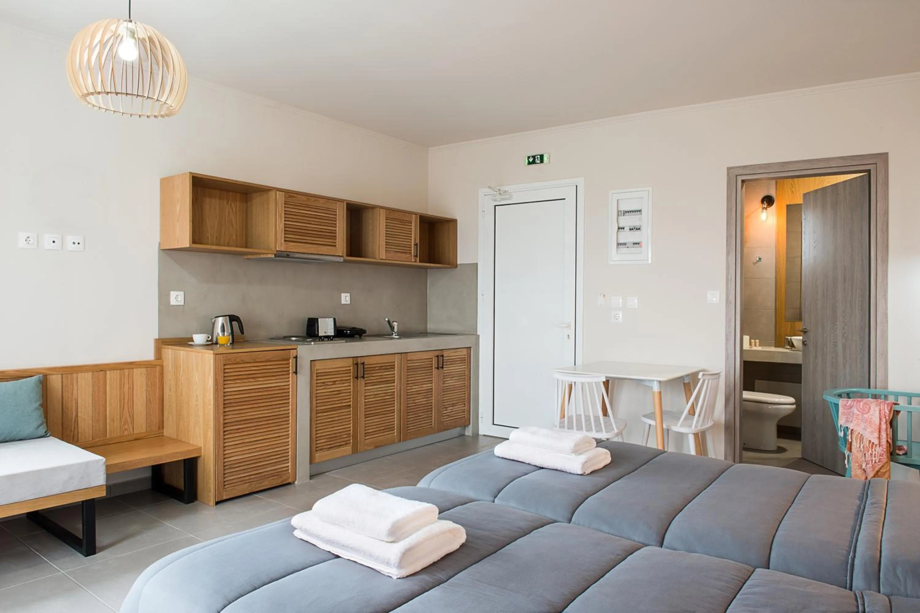 Kitchen or kitchenette, Bed in Elafonisi Resort by Kalomirakis Family